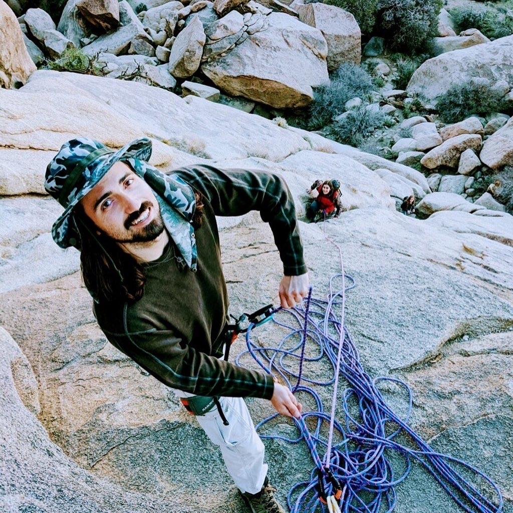 Bronwyn scrambling up some rocks. Jordan setup a rope so she would feel safe, but he didn't need one!