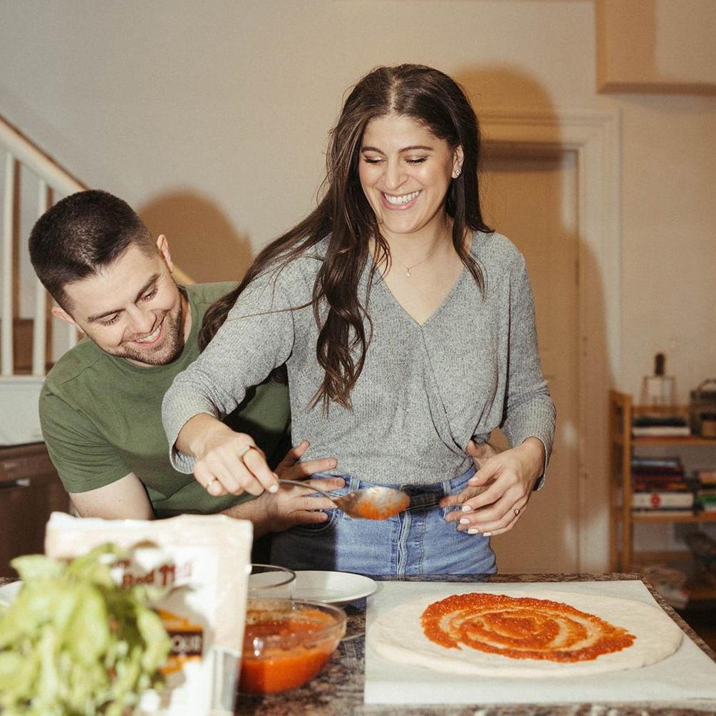 Our engagement photos in our house - we just had to make pizza