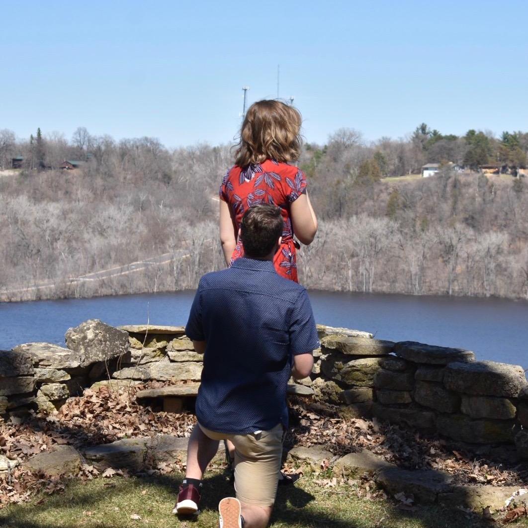 Nick proposed in the backyard of a family friends home with a beautiful view of the St. Croix river