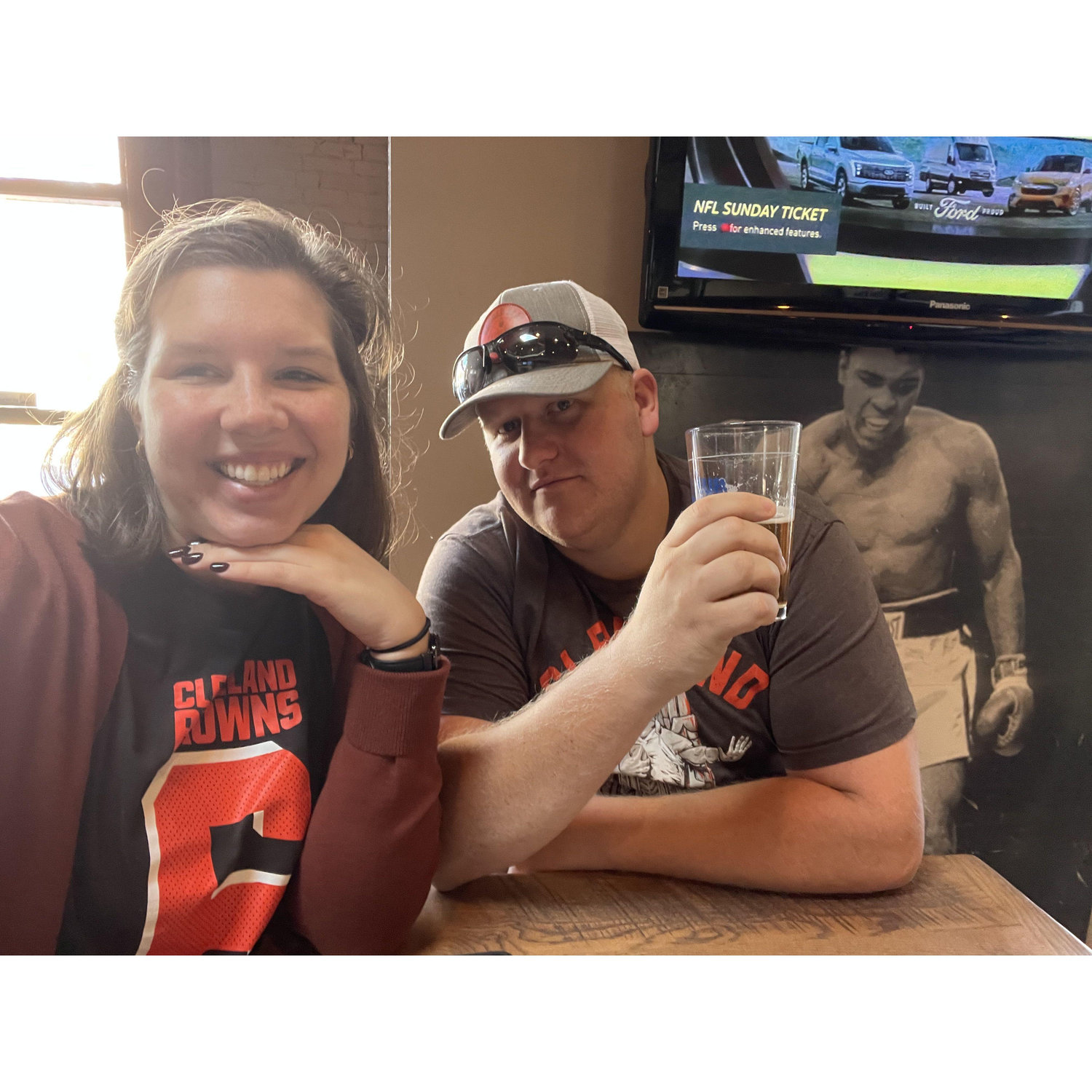 Supporting their favorite team from afar (no matter how disappointing the season is)!