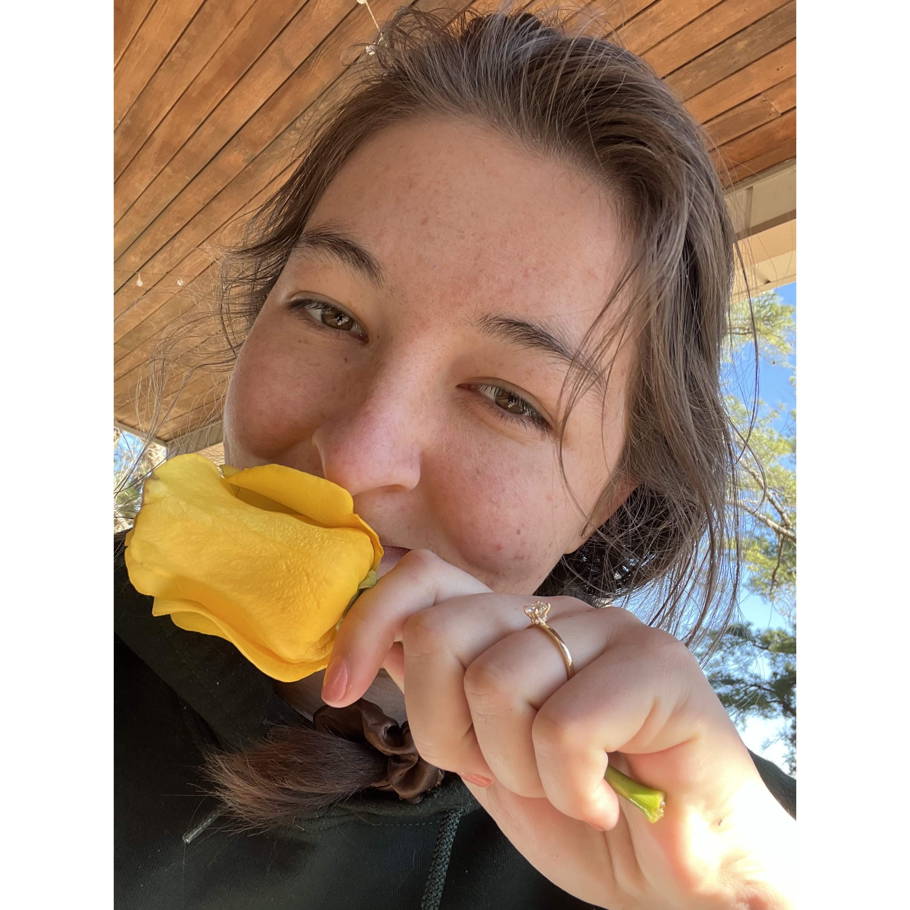 That beautiful yellow rose ain't hiding my newly engaged smile.
