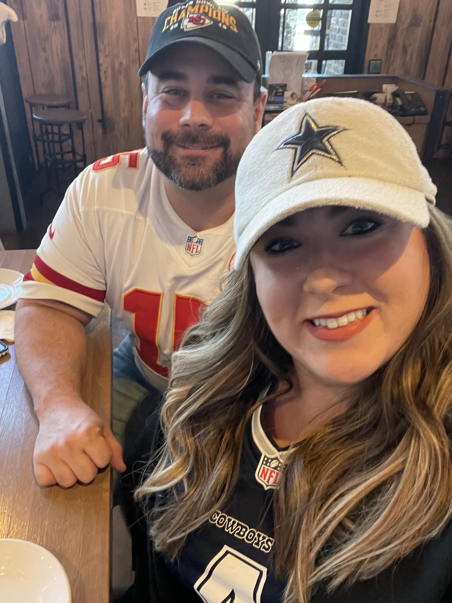 A Cowboys fan and a Chiefs fan fell in love. We love football together.