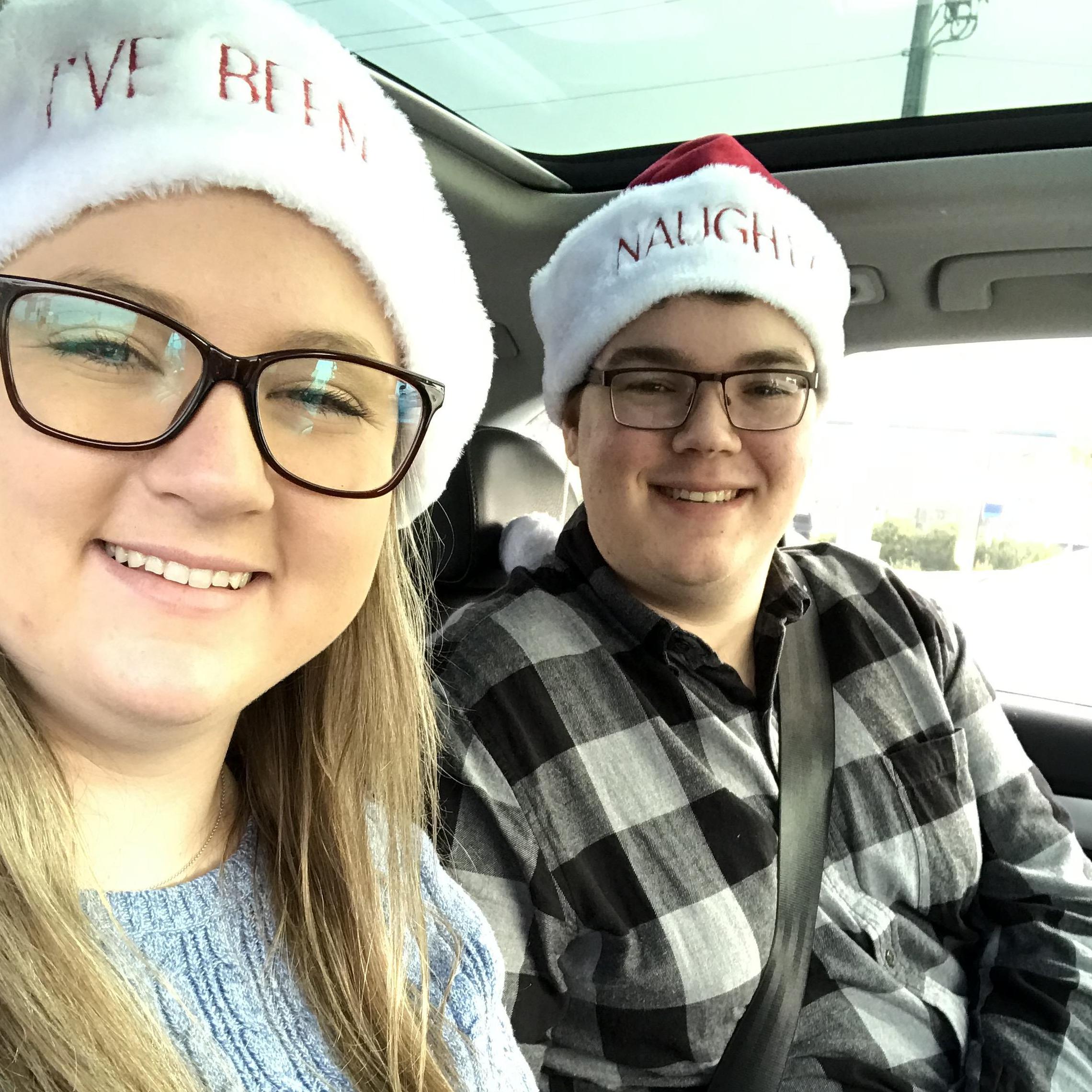 Hers says, "I've been nice" and his says "Naughty". We might be wearing the wrong hats and need to swap!