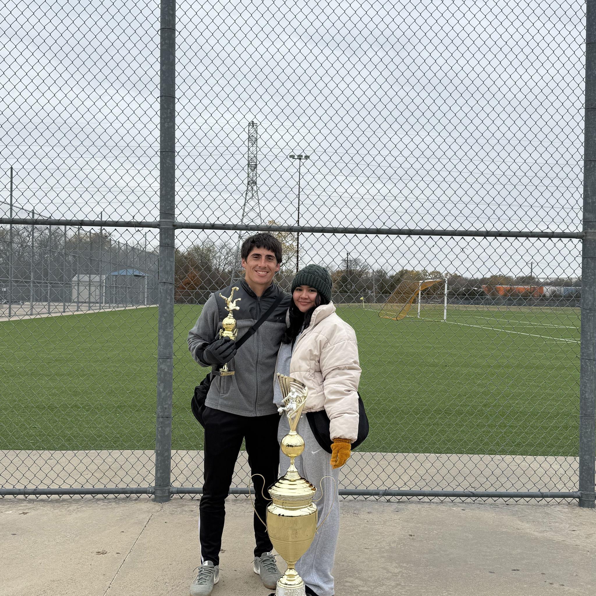 12/14/25: Jackie is still watching Nate win more trophies! (In the cold)