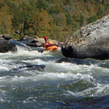 Carol bounces around rocks on the Raven Fork near Cherokee, NC.