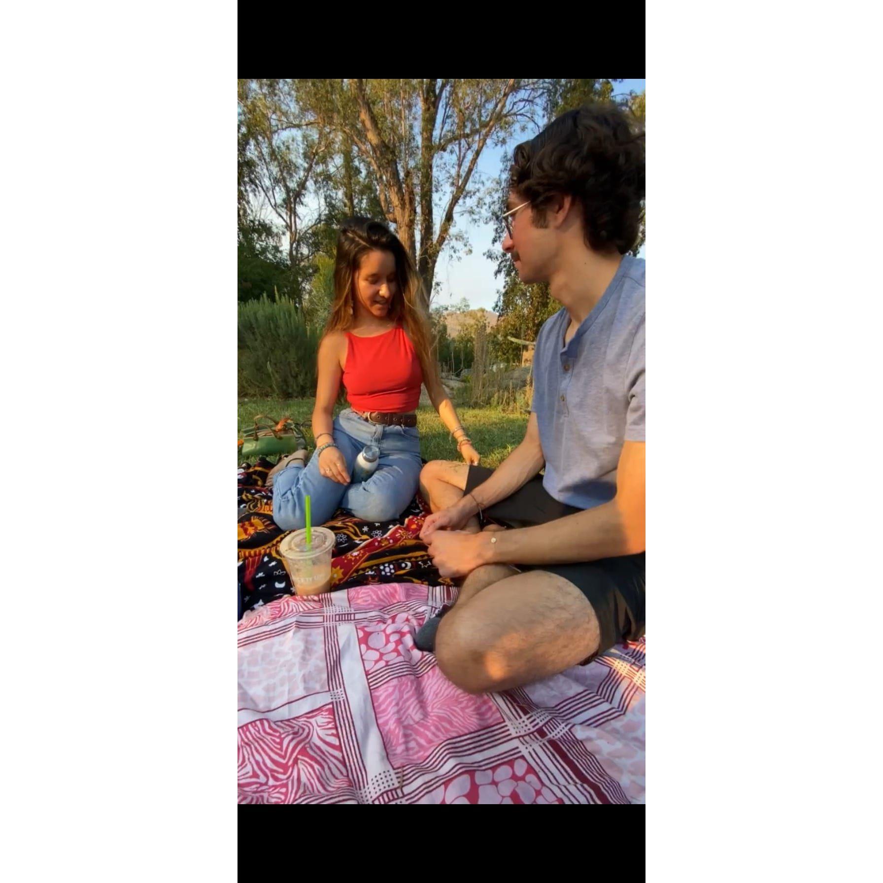 The first 'hang-out' as a couple Genesis and Michael shared with friends at UCR's remote/nearly inaccessible 'Picnic Hill'. Here, Genesis picked grass and placed it on Michael's knee for safe-keeping.