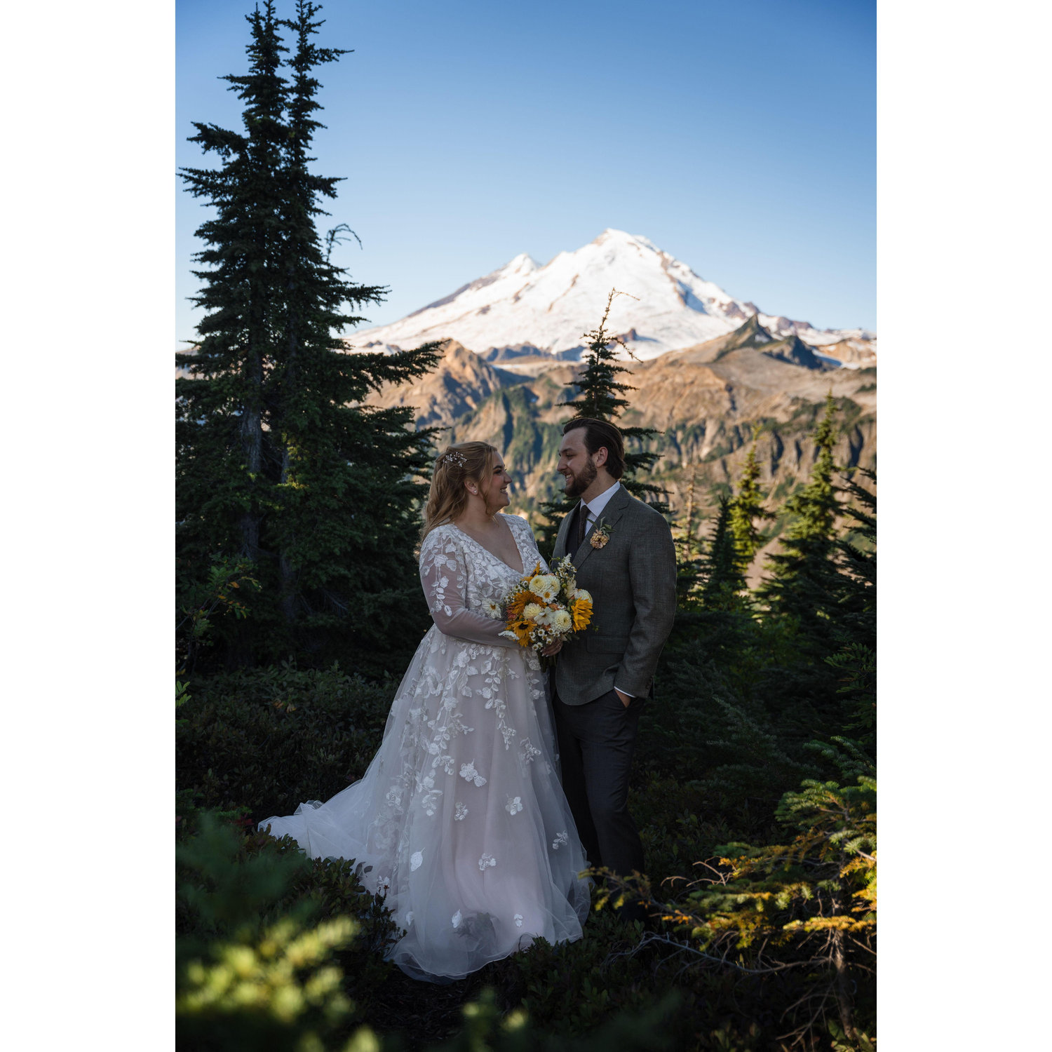 Our First Picture as a married couple. Mount Baker sitting in the background. Never in a million years did we think we'd be this lucky to have such a gorgeous photo on our wedding day.