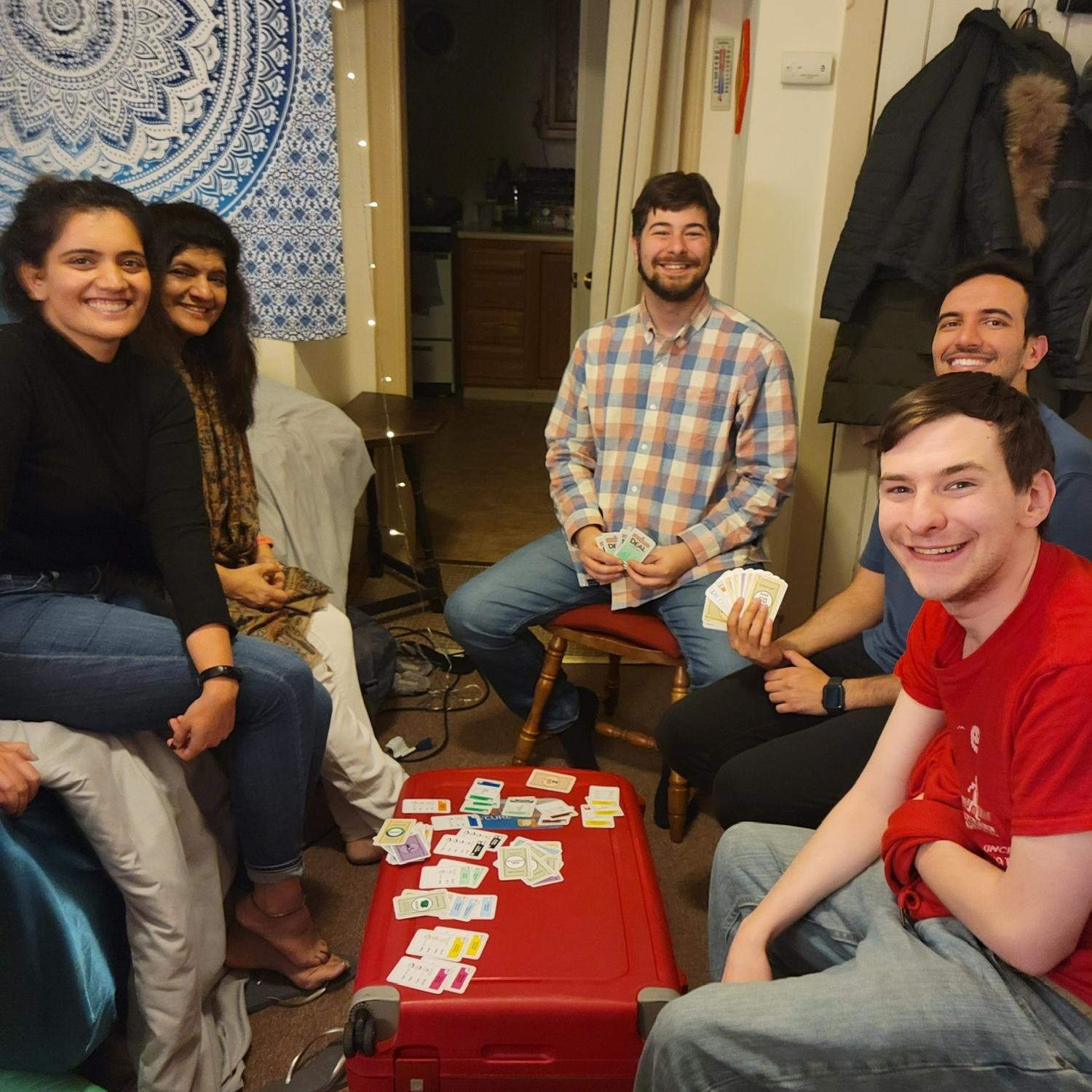 With our moms and brothers playing Monopoly!