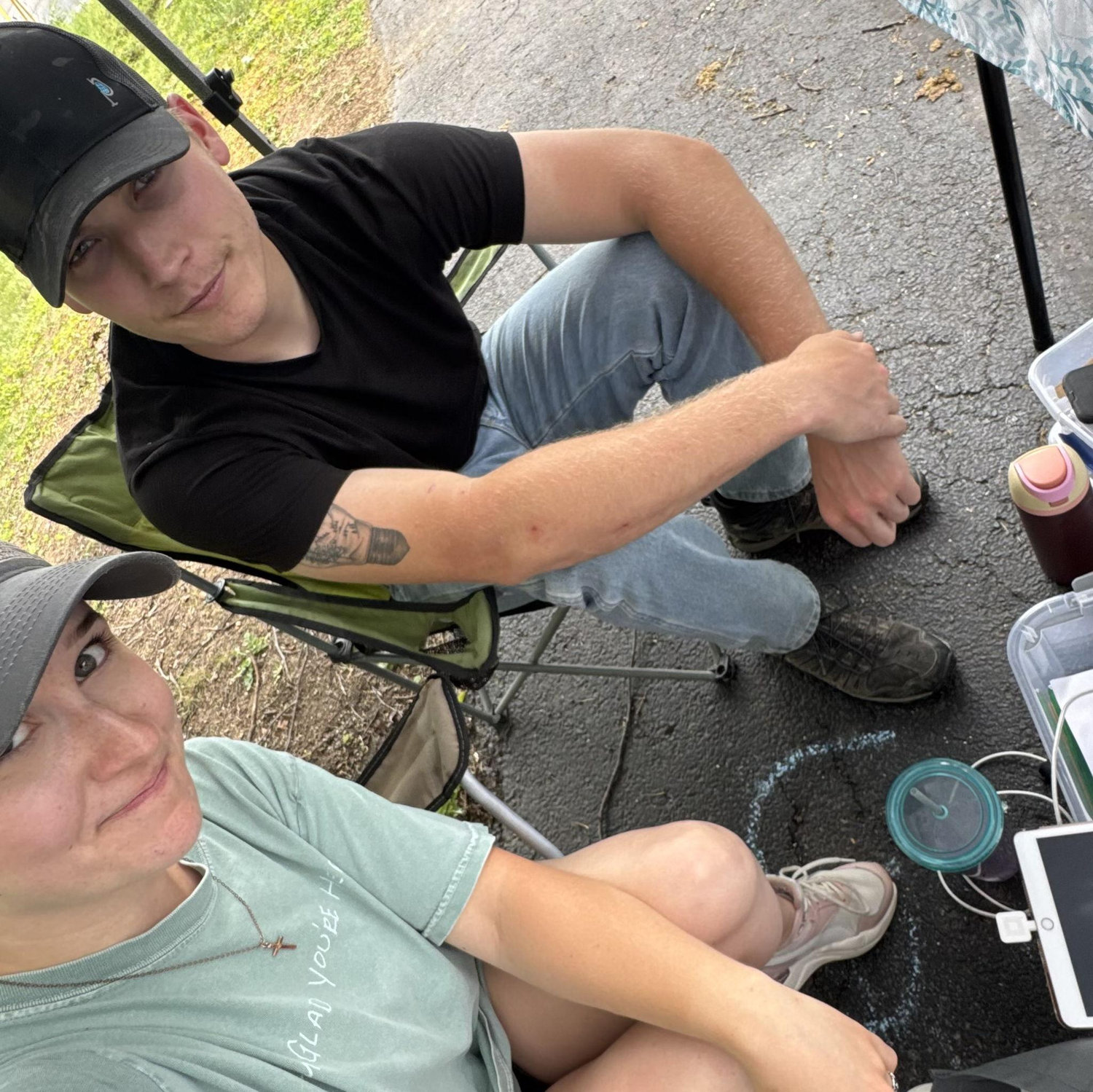 Jake drove an hour one way just to help Melody run her booth at a festival... in the DUMPING rain.