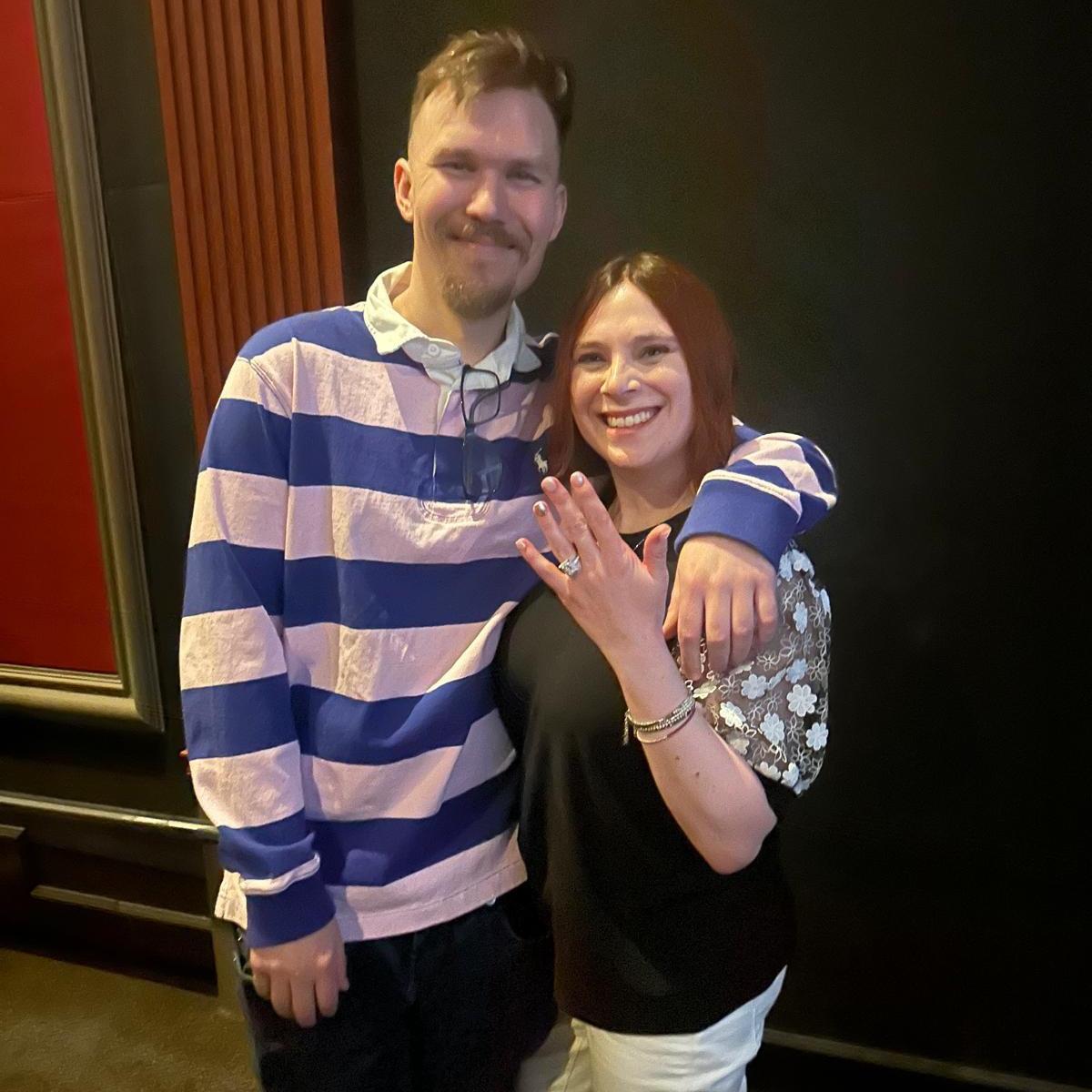 At 02/23/2025 Roadhouse Cinema where he rented out the theater for the surprise engagement.