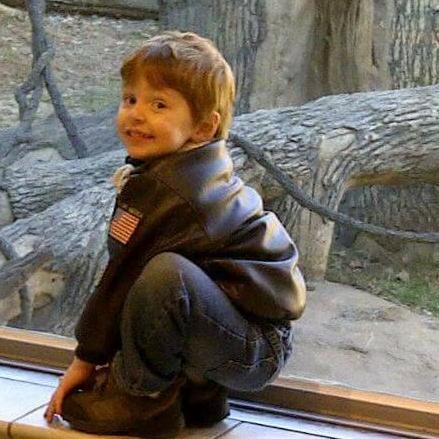 Nick, our son, enjoying himself at the zoo.