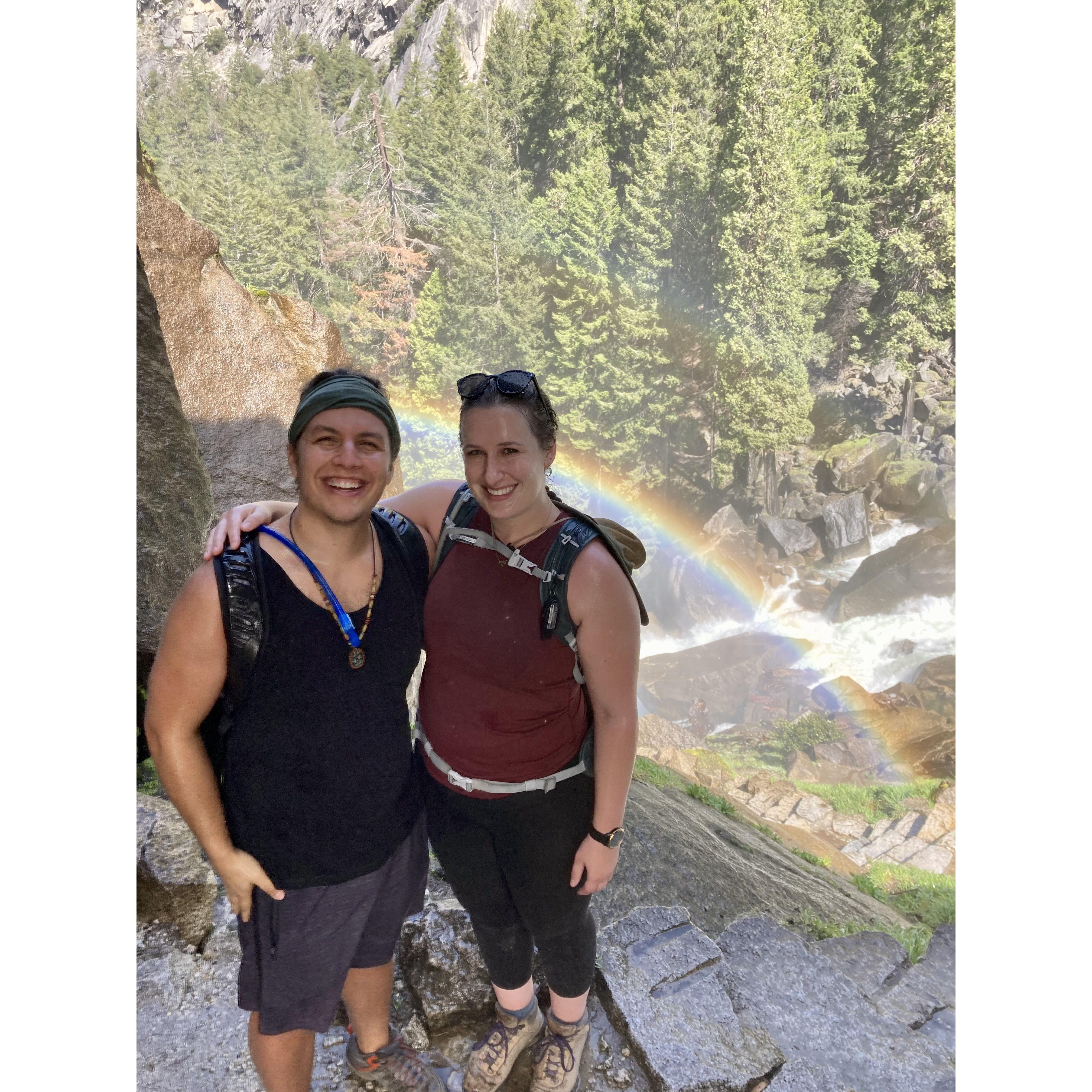 Hiking under a waterfall in Yosemite National Park