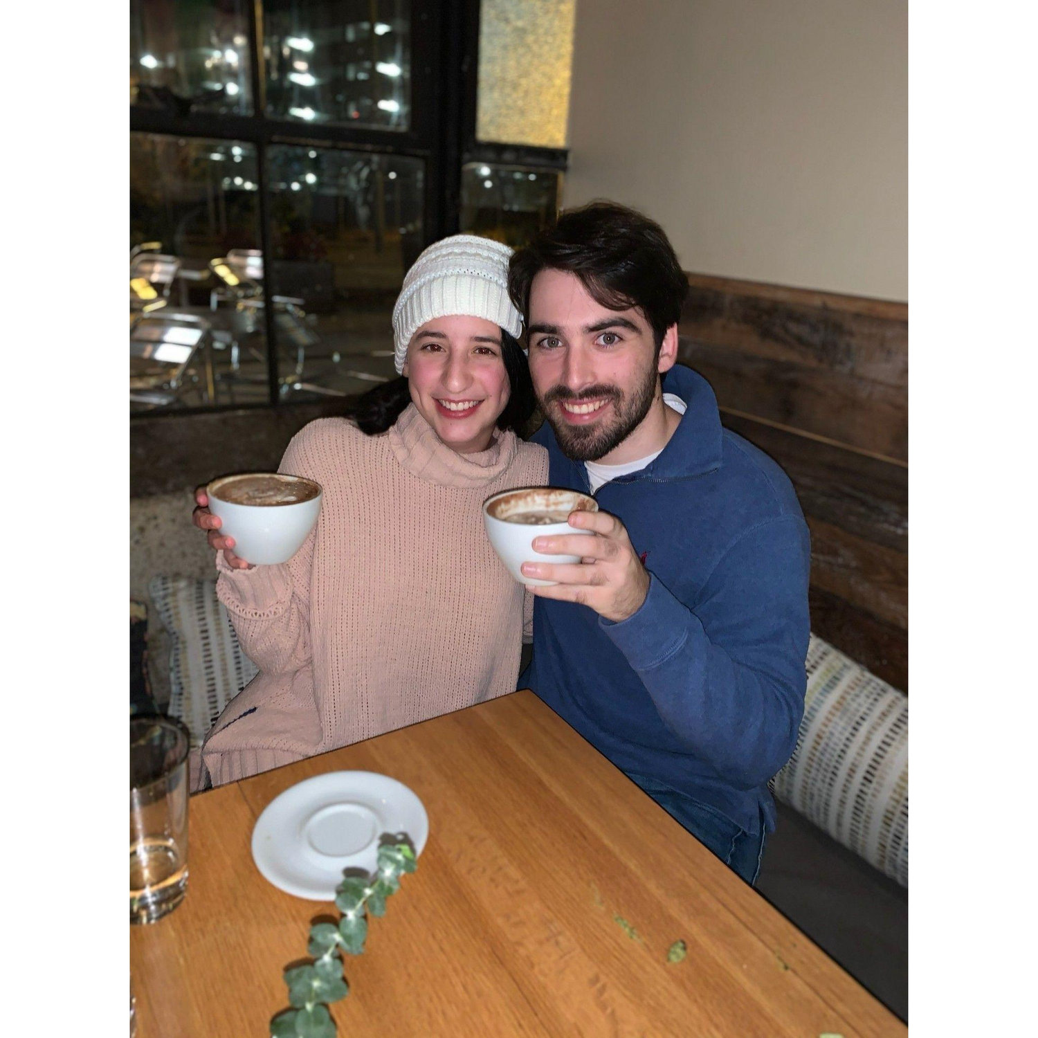 Jonathon’s favorite snap of us getting cozy at Amélie’s in NODA—latte memories and even better hot chocolate. Miss those good times!☕🍫