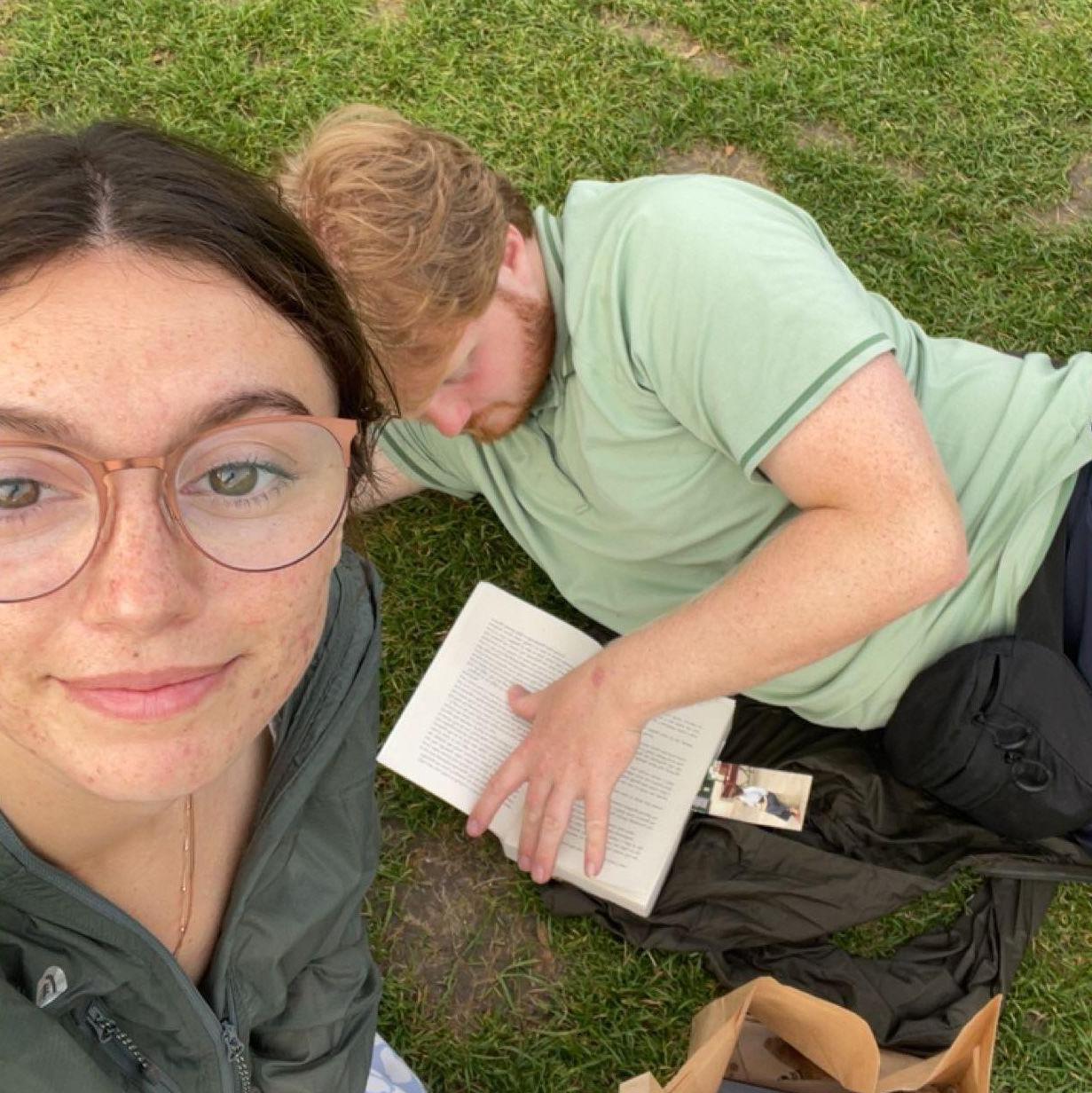 snacks and reading below the Eiffel Tower circa 2023