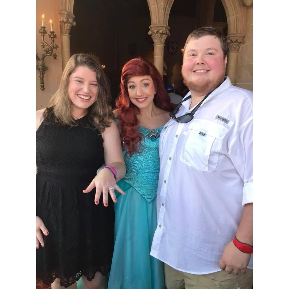 Ariel in aww of Mallory's beautiful engagement ring.
