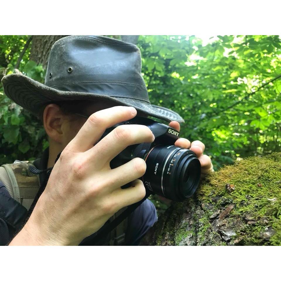 Capturing an inch worm in the moss...