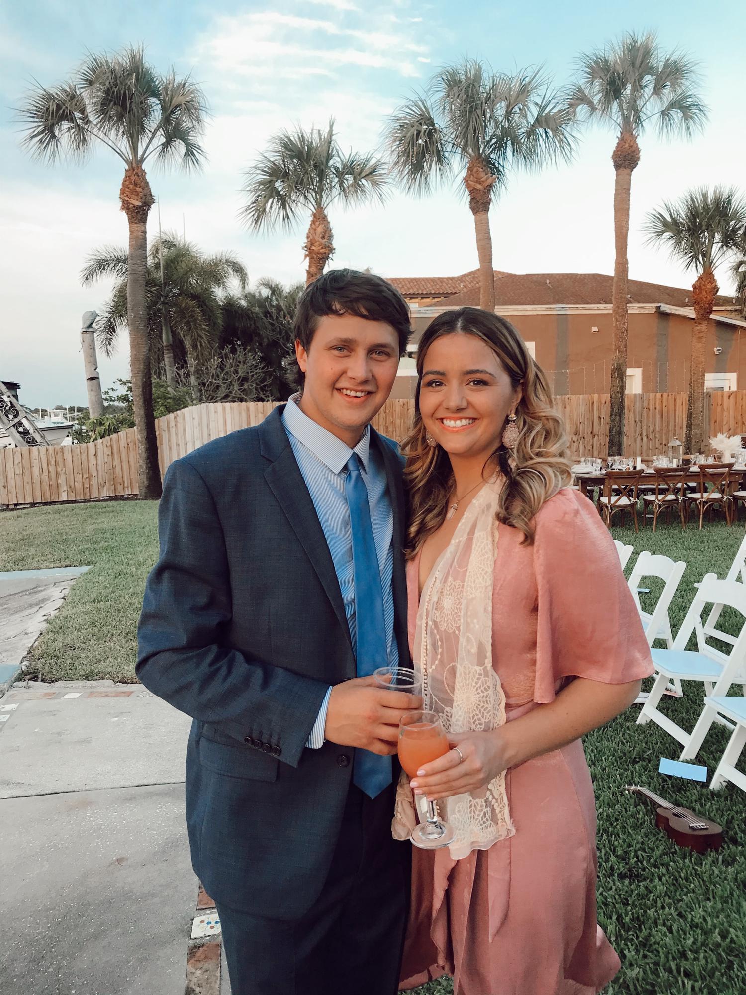 Kevin and Olivia at Anna and Tim Carlson's wedding at the Keegan family home in St. Petersburg, FL.