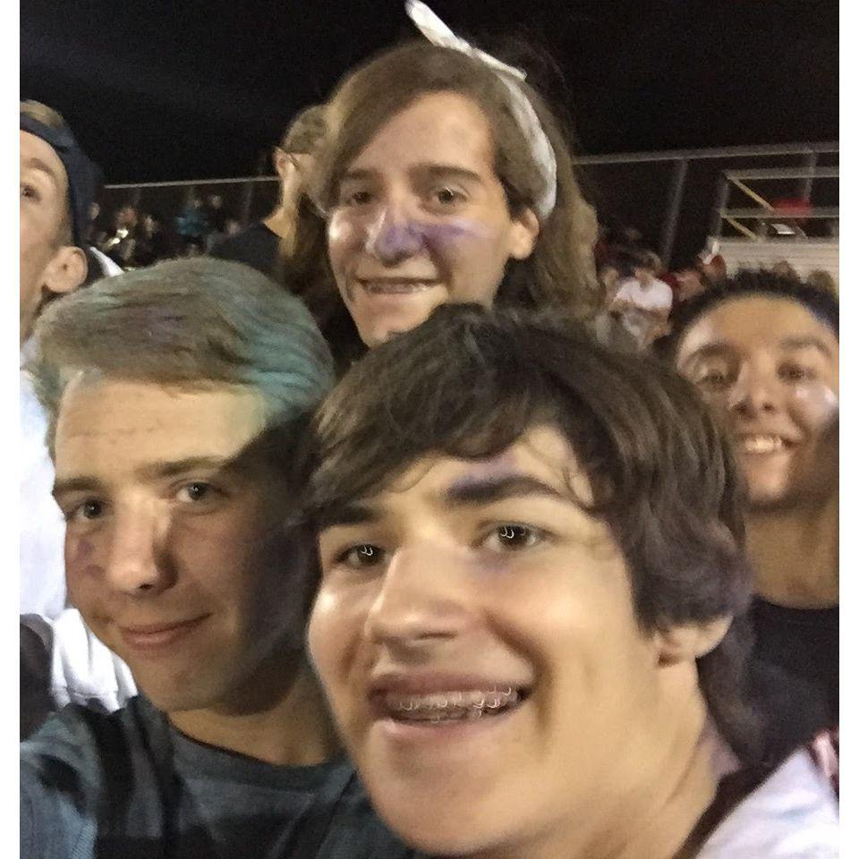 Sara, Jonathan, and Kyle at a football game Freshman year of high school (not dating yet!)