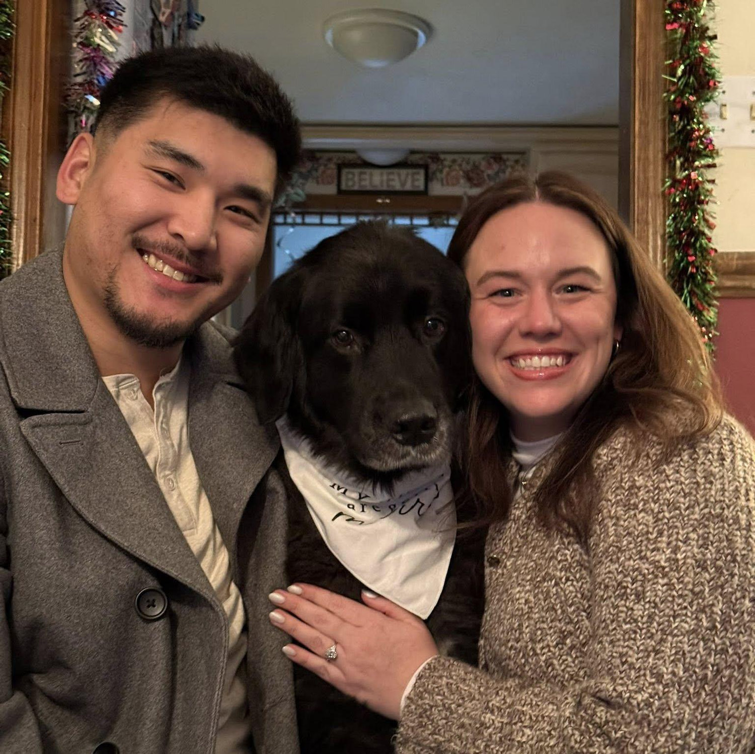 Our little family! Meeko was clearly thrilled by the news that his "humans are getting married".