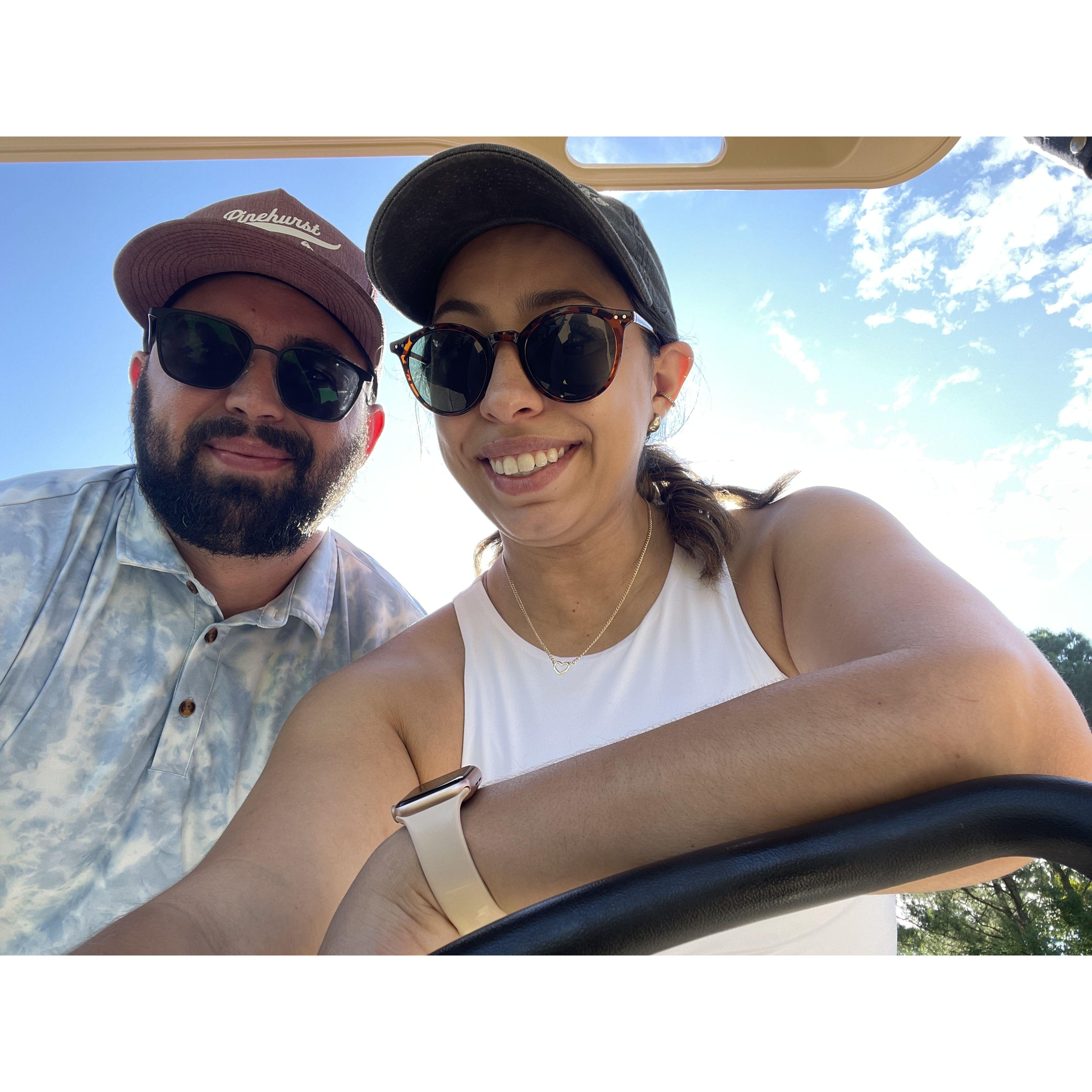 A golfer and her caddy