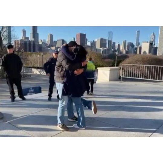 When Meghann said yes on the steps of Shed Aquarium in Chicago.