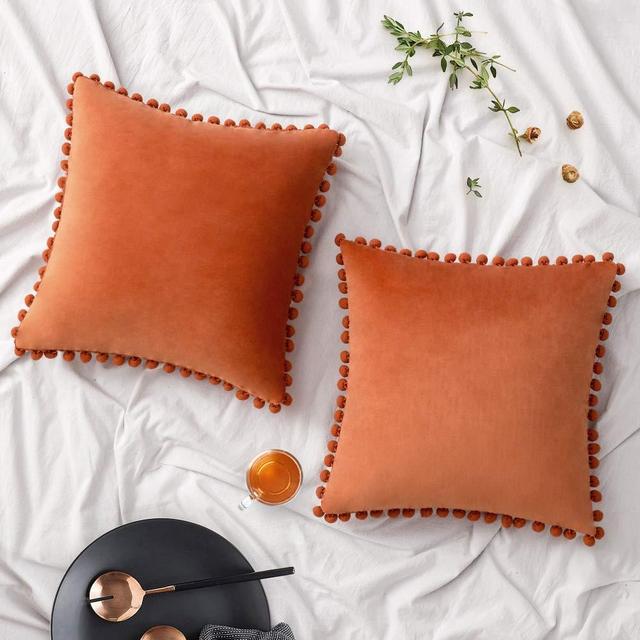 Woaboy Pack of 2 Velvet Throw Pillow Covers Pompom Decorative Pillowcases Solid Soft Cushion Covers with Poms Square Cojines for Couch Living Room Sofa Bedroom Car 18x18inch 45x45cm Orange