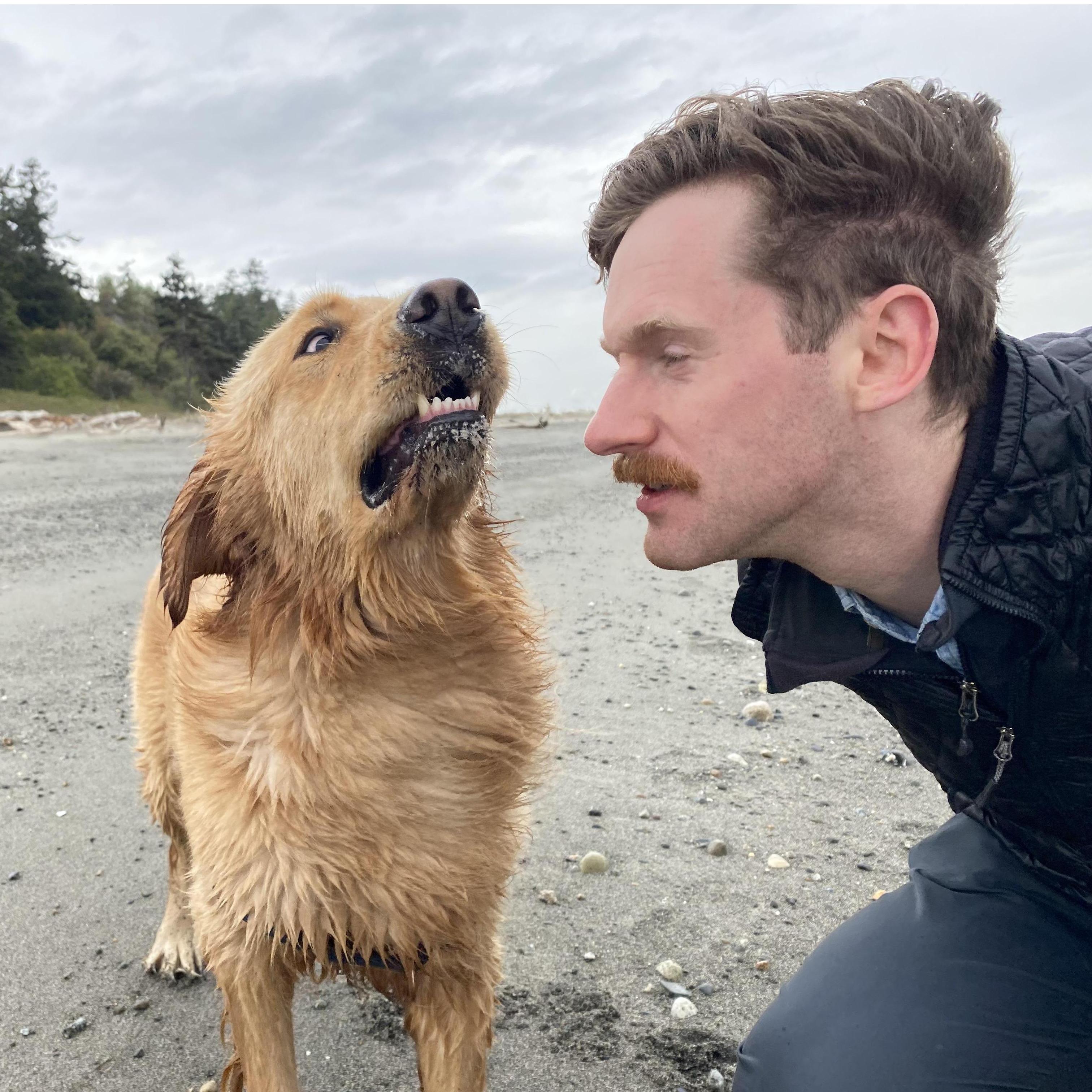 A very windy day at the beach on Marrowstone Island. Jasper is teaching Bún proper sneering technique. (2021)