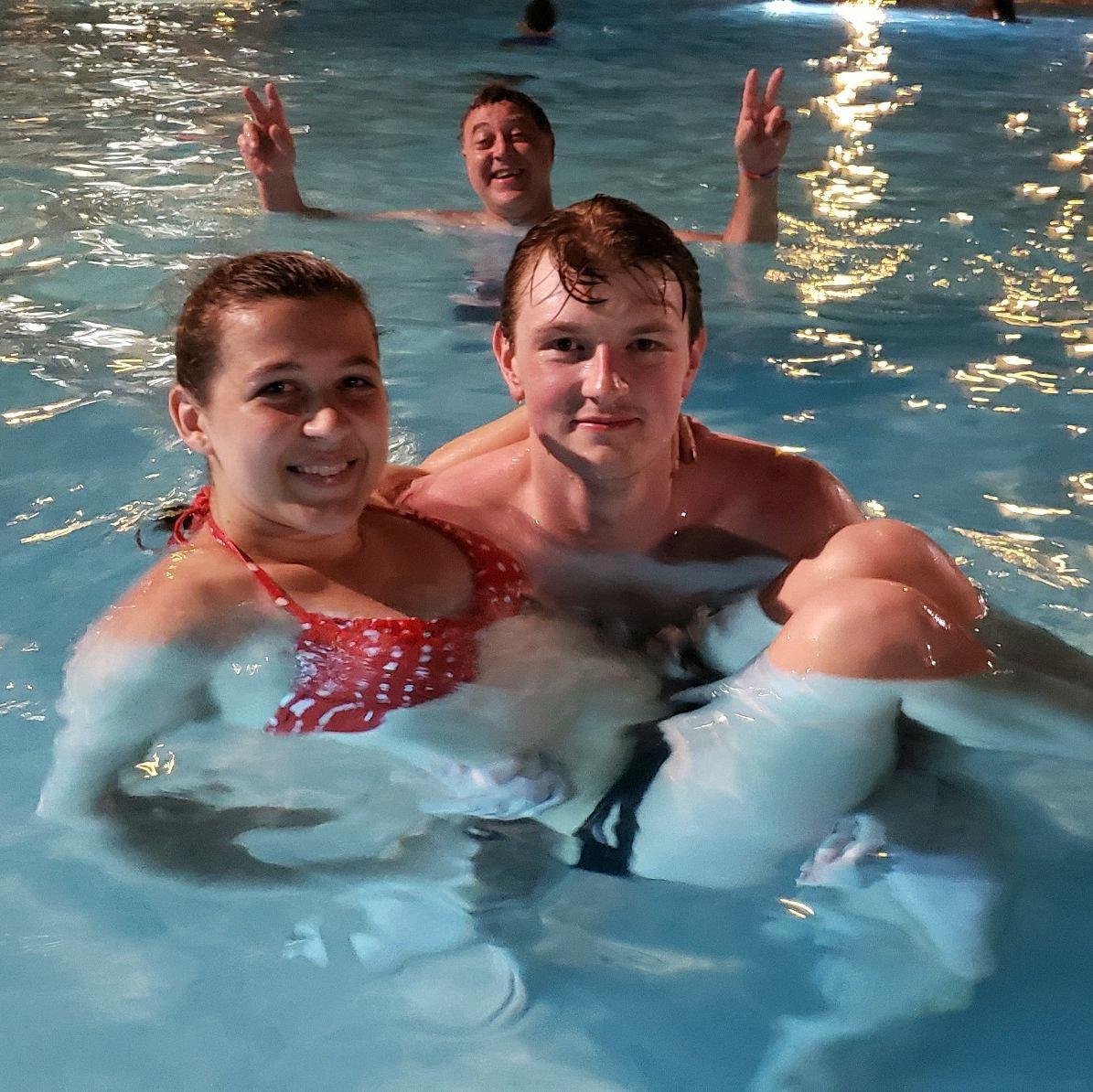 Florida pool with Dad photobombing
