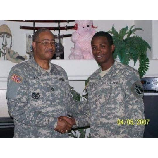 Julian with Mike upon enlisting into the Army.