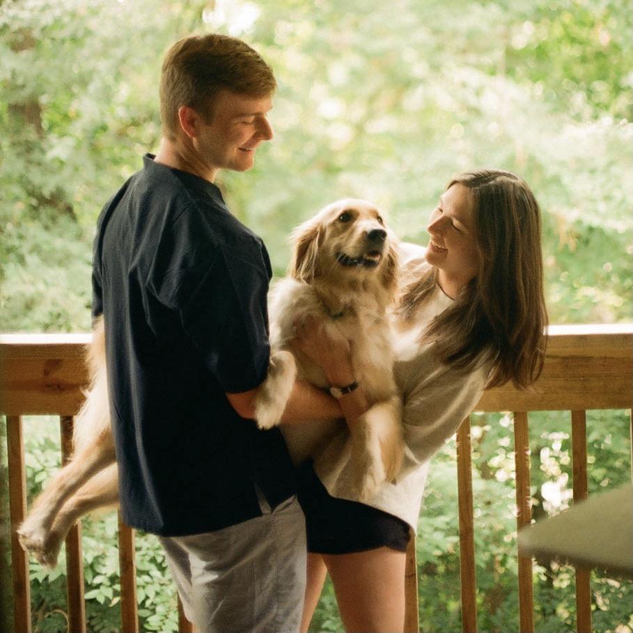 Fargo's favorite place—Adrianne's back porch—and her favorite people (AC and JB)