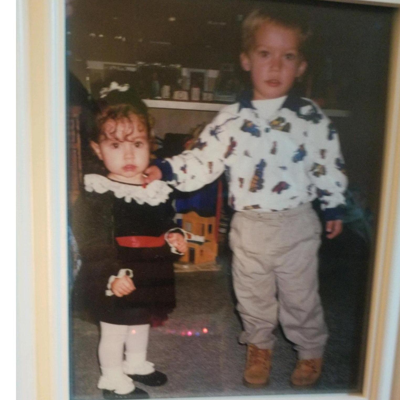 1999? Yeah.... He was probably trying to tickle me... nothing has changed except my typical attire no longer includes dresses or scrunchies. ;) ...and Cutter usually wears shorts. ;)
