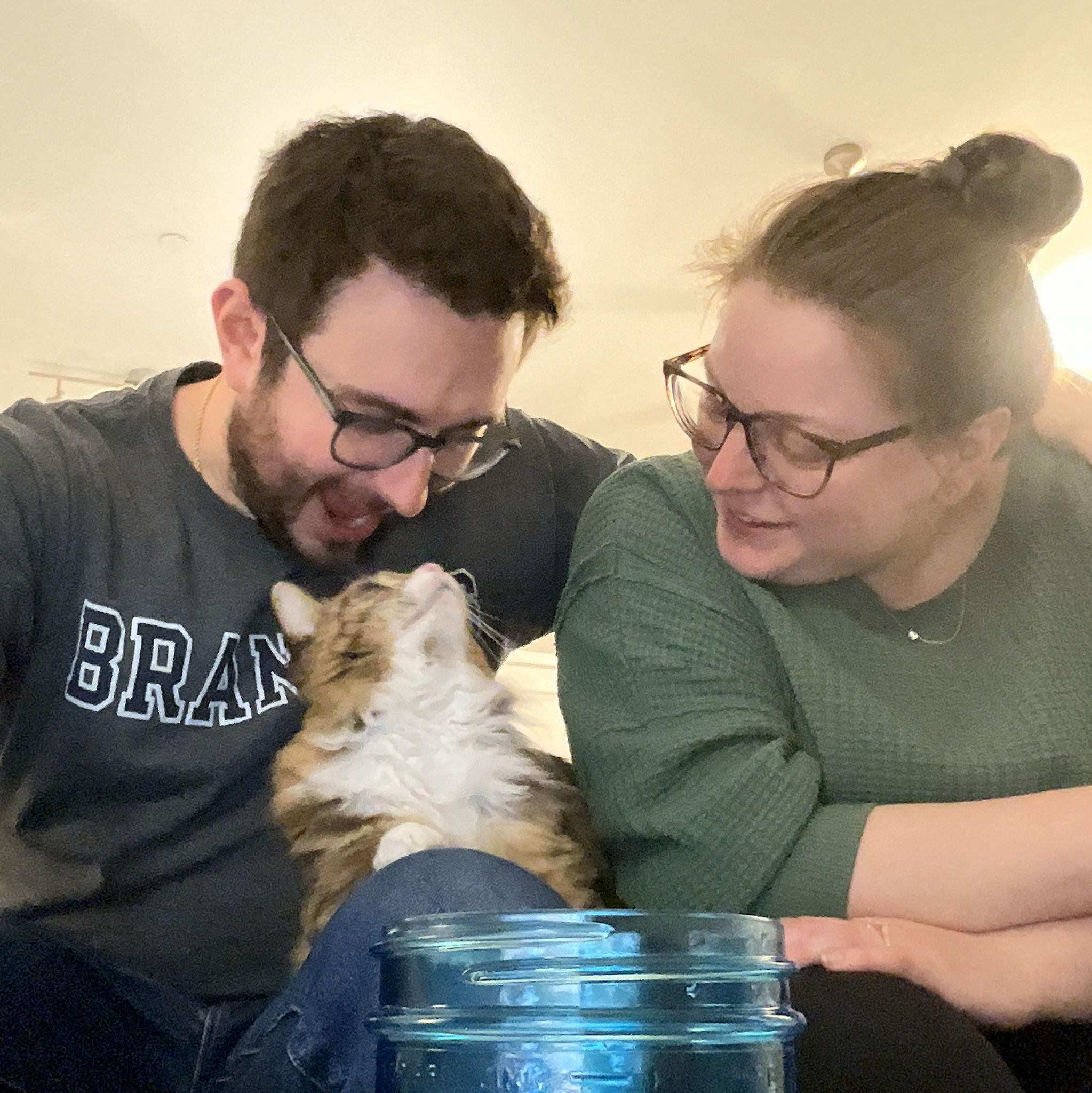 December 2025 - With our beautiful perfect cat Kasha who only bites a little.