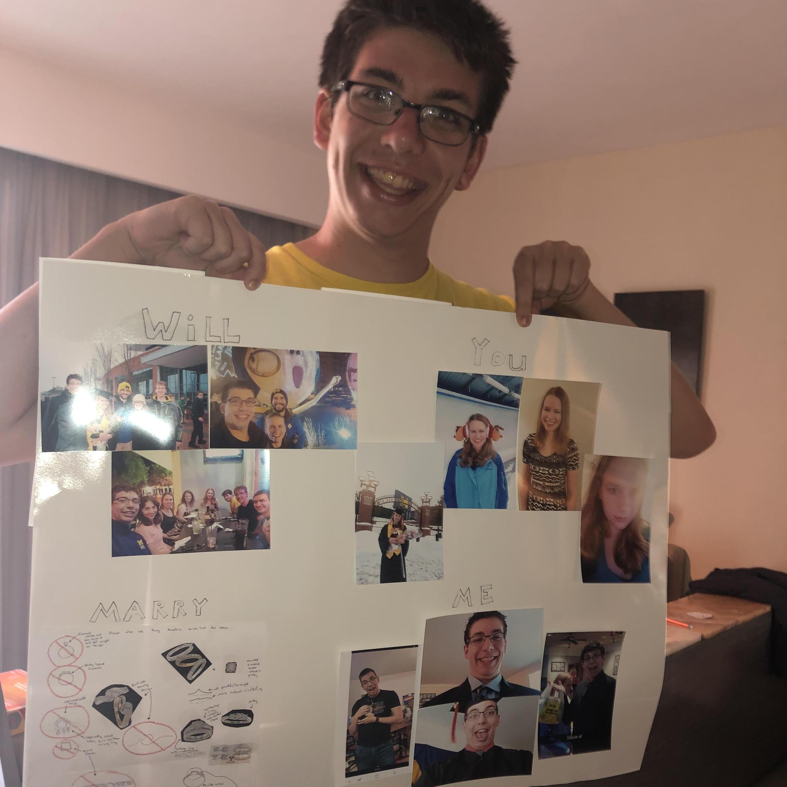 Hunter with the poster from our engagement