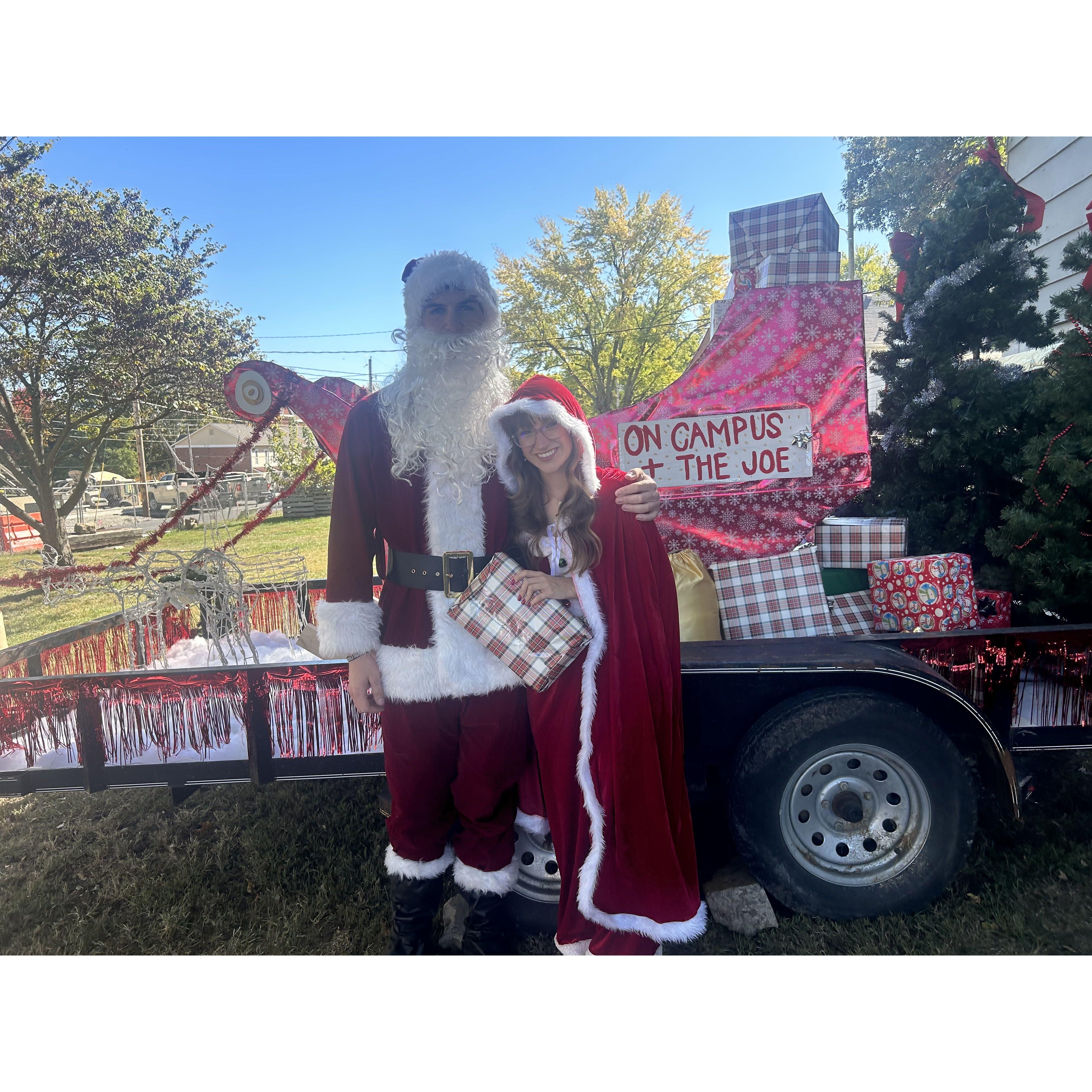 Being apart of the Benedictine on campus houses homecoming float as Santa and Mrs. Claus