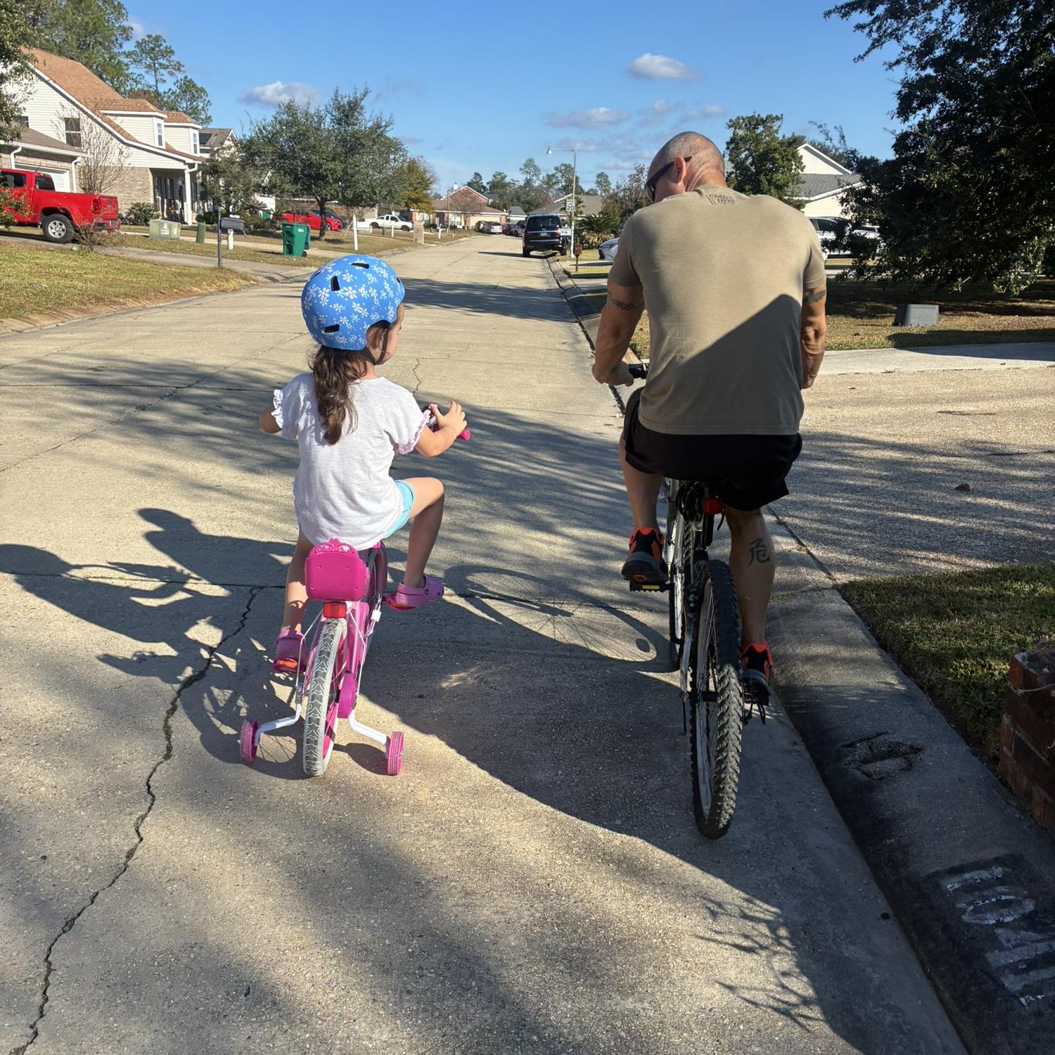 Learning how to ride a bike.
