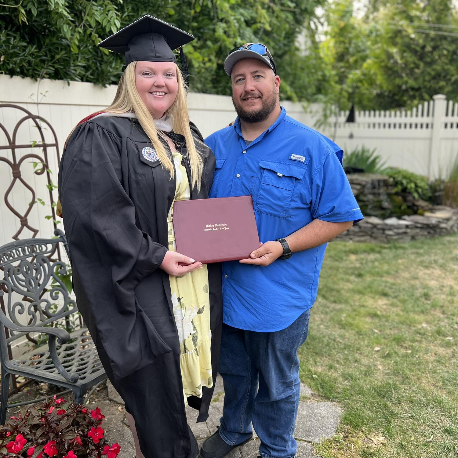 to Dana's master's degree!