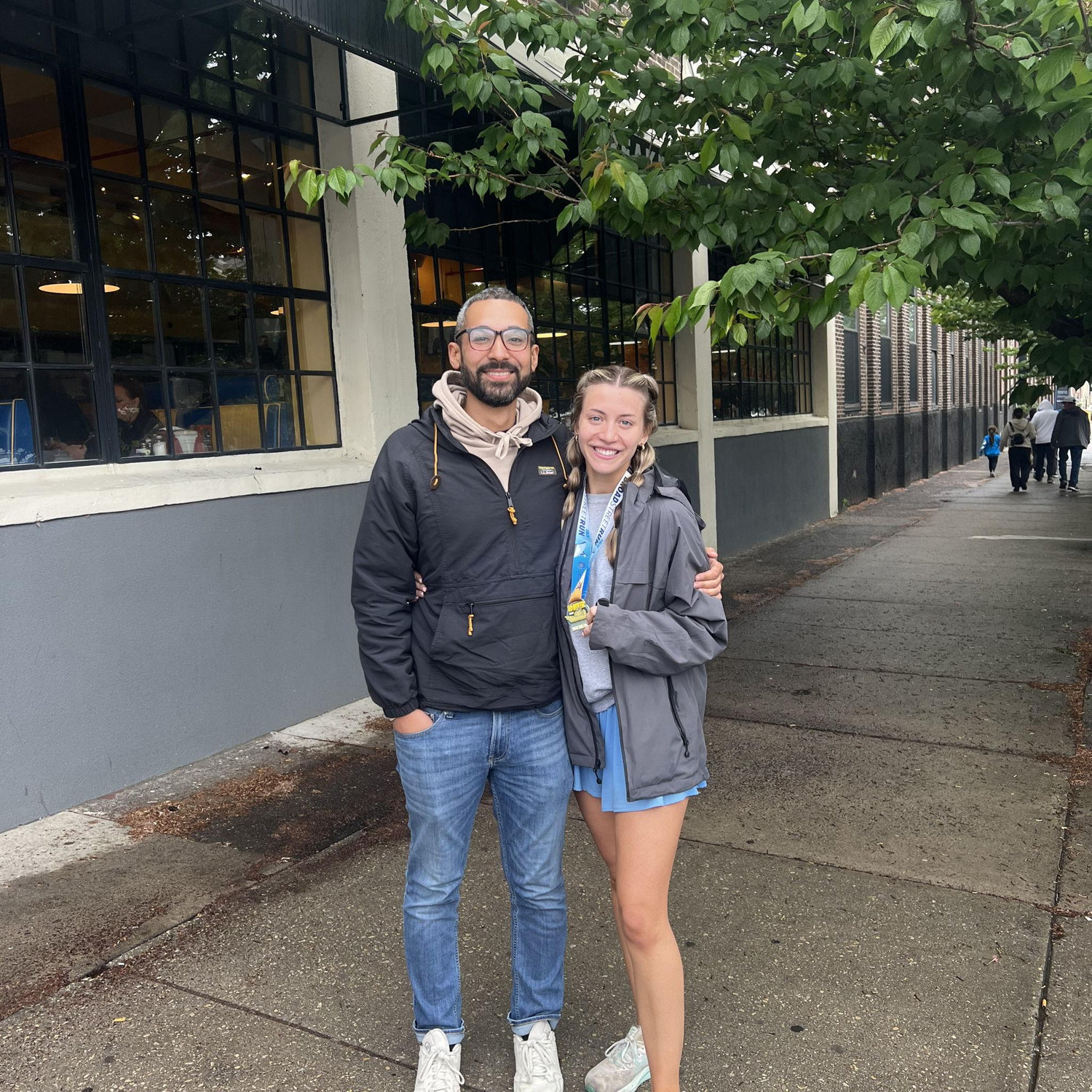 Salomon cheering for Paige in the Broad Street Run 2024