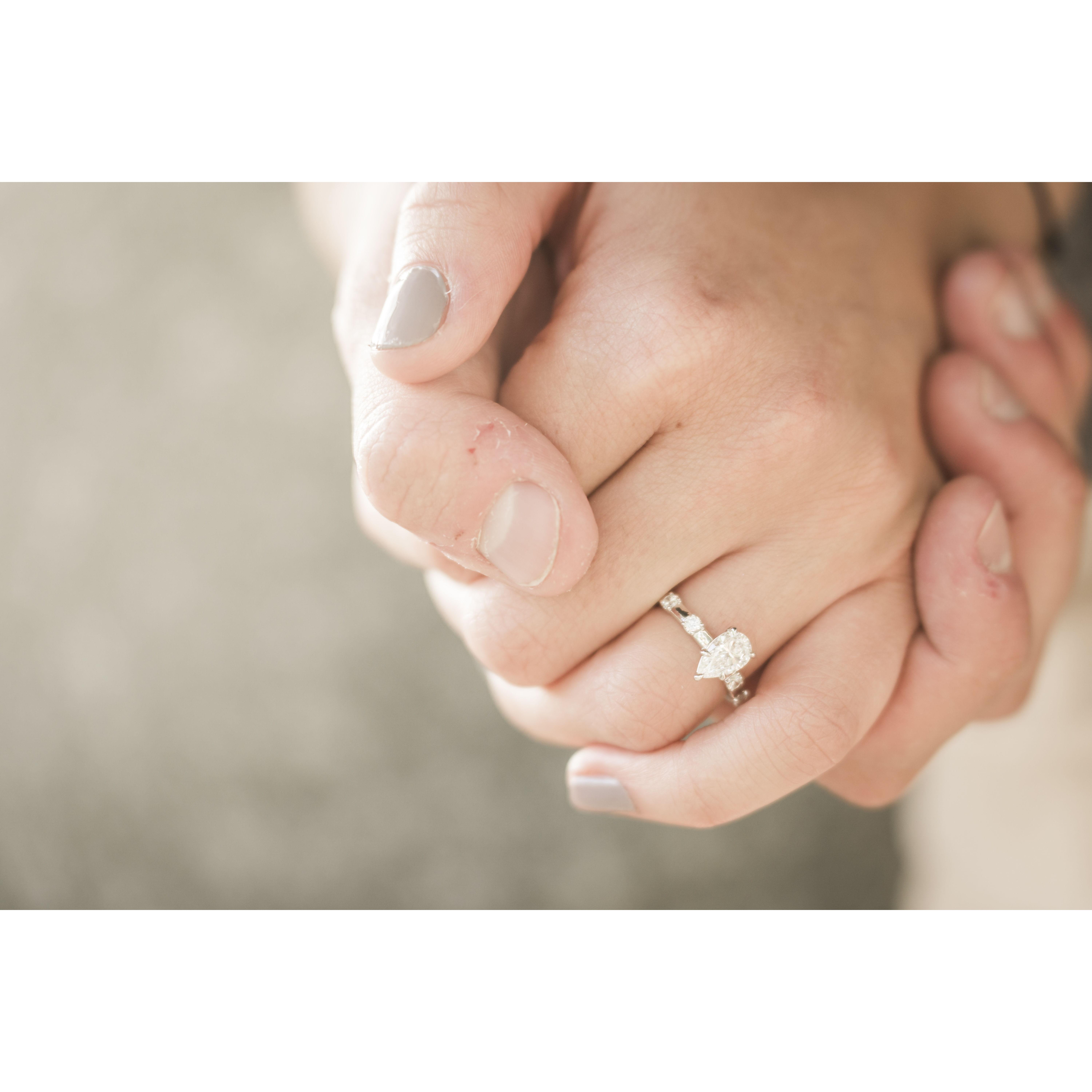 Molly's ring has two diamonds on each side that were her grandmother's:) Shane got the ring custom made and it couldn't be more perfect:)