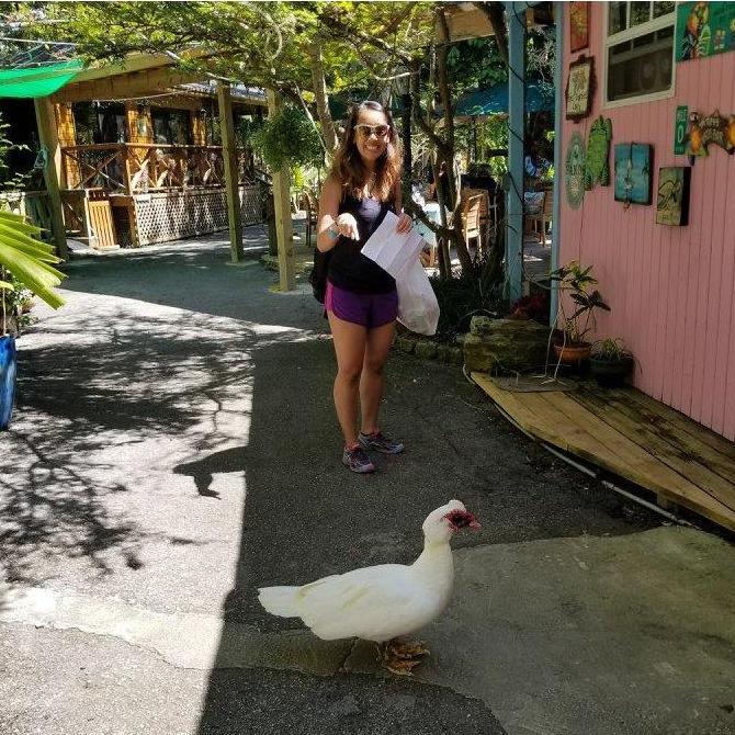 Bahama chilling with a duck