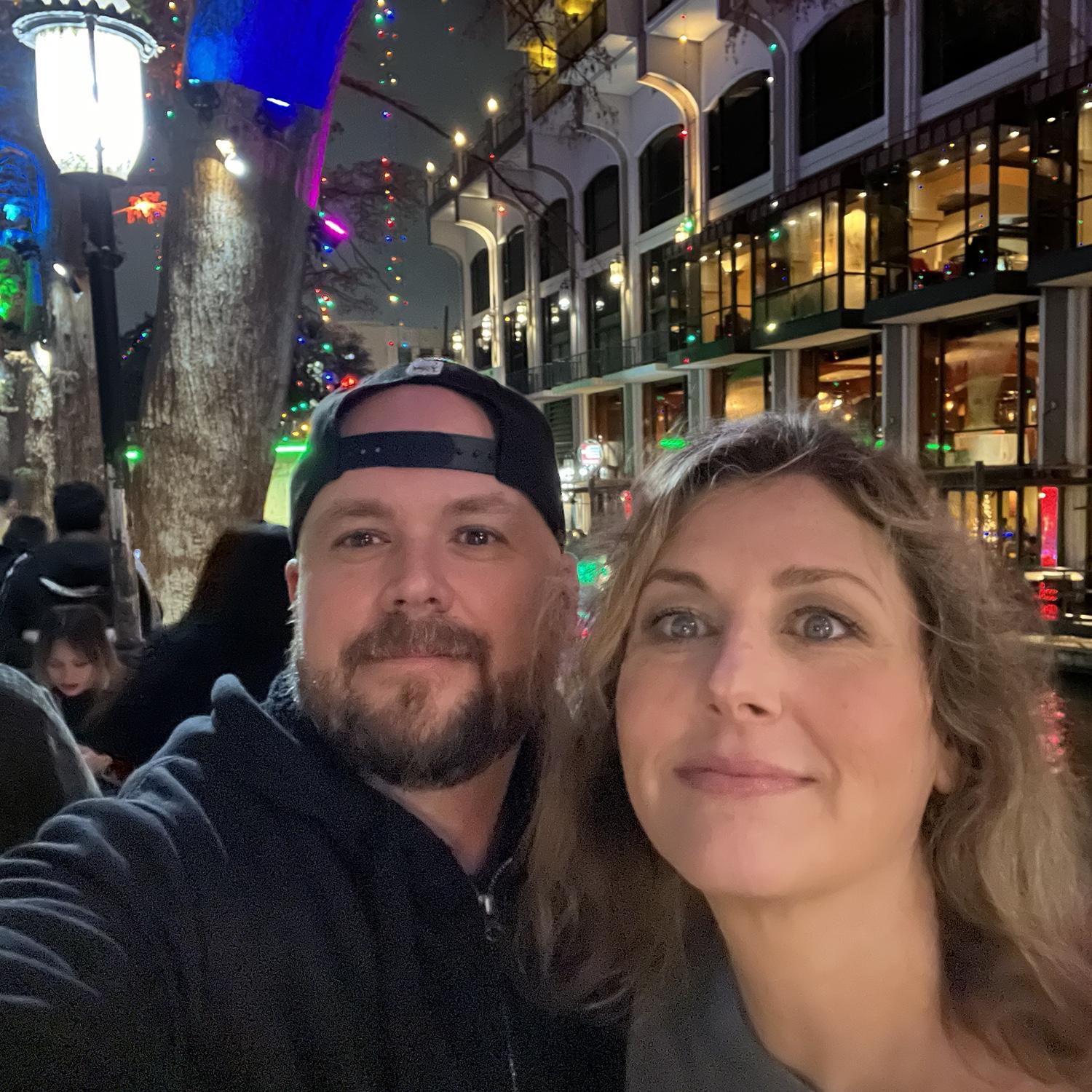 On the riverwalk in San Antonio. We are on the boat tour.