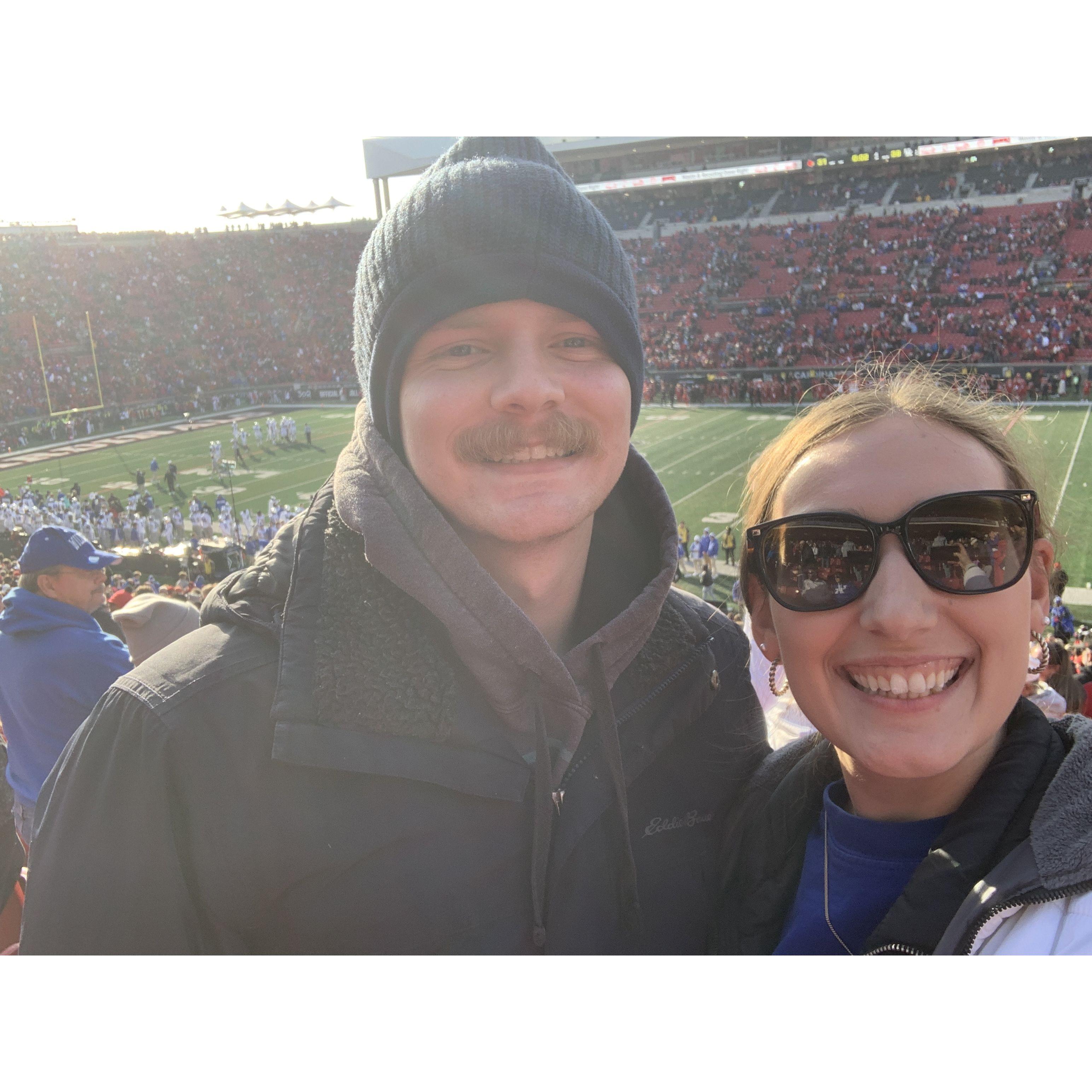 Smiling big because our Cats won!  L's down, baby!