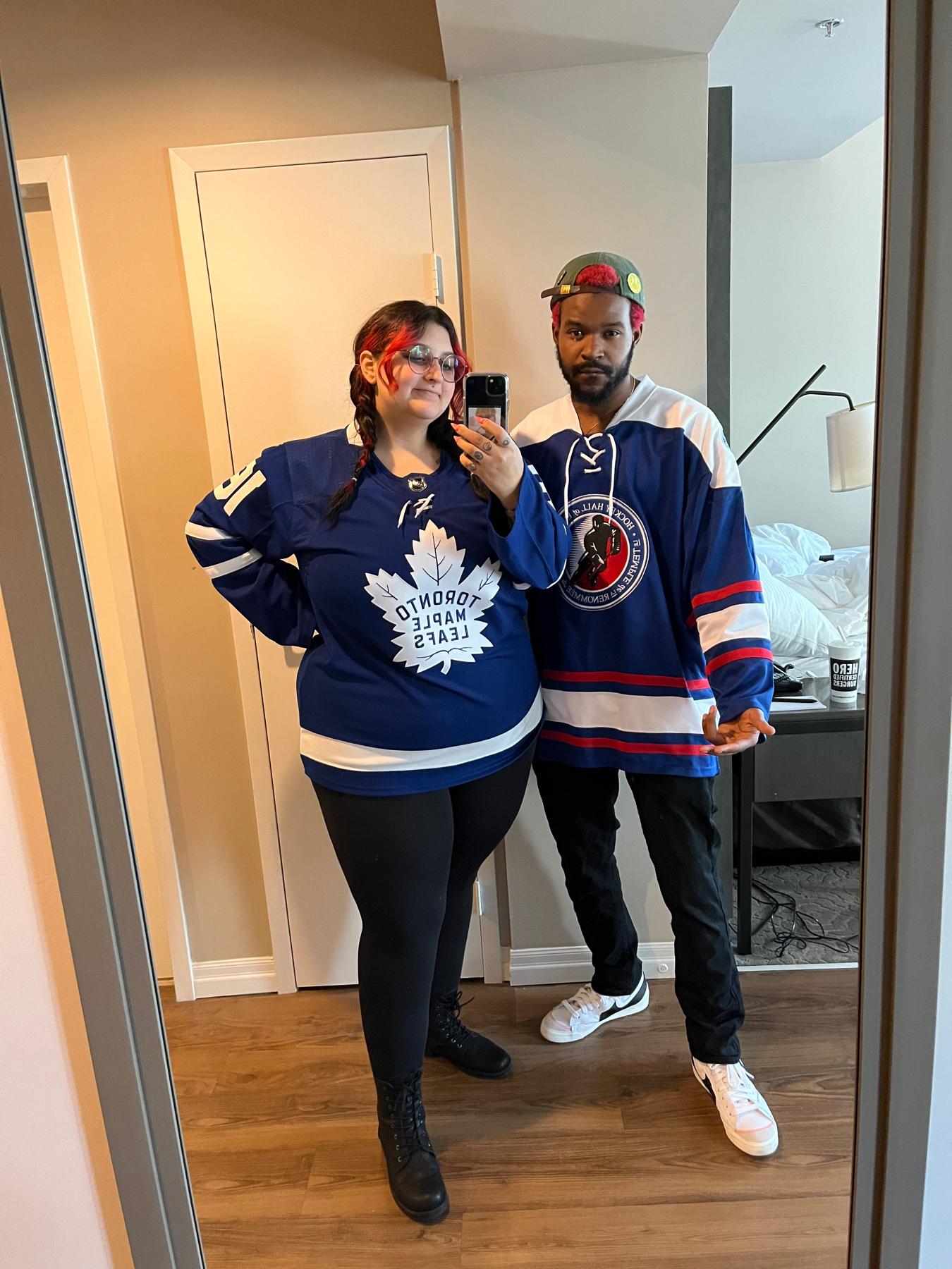 Us celebrating our engagement by watching game 7 of the first round of the Stanley Cup playoffs