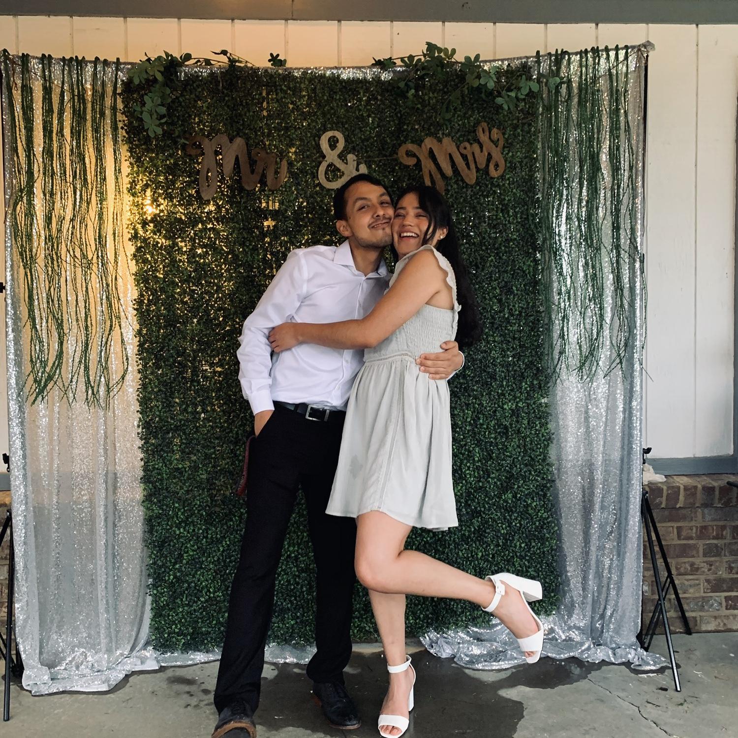 Six months into dating and attending our first wedding as a couple.