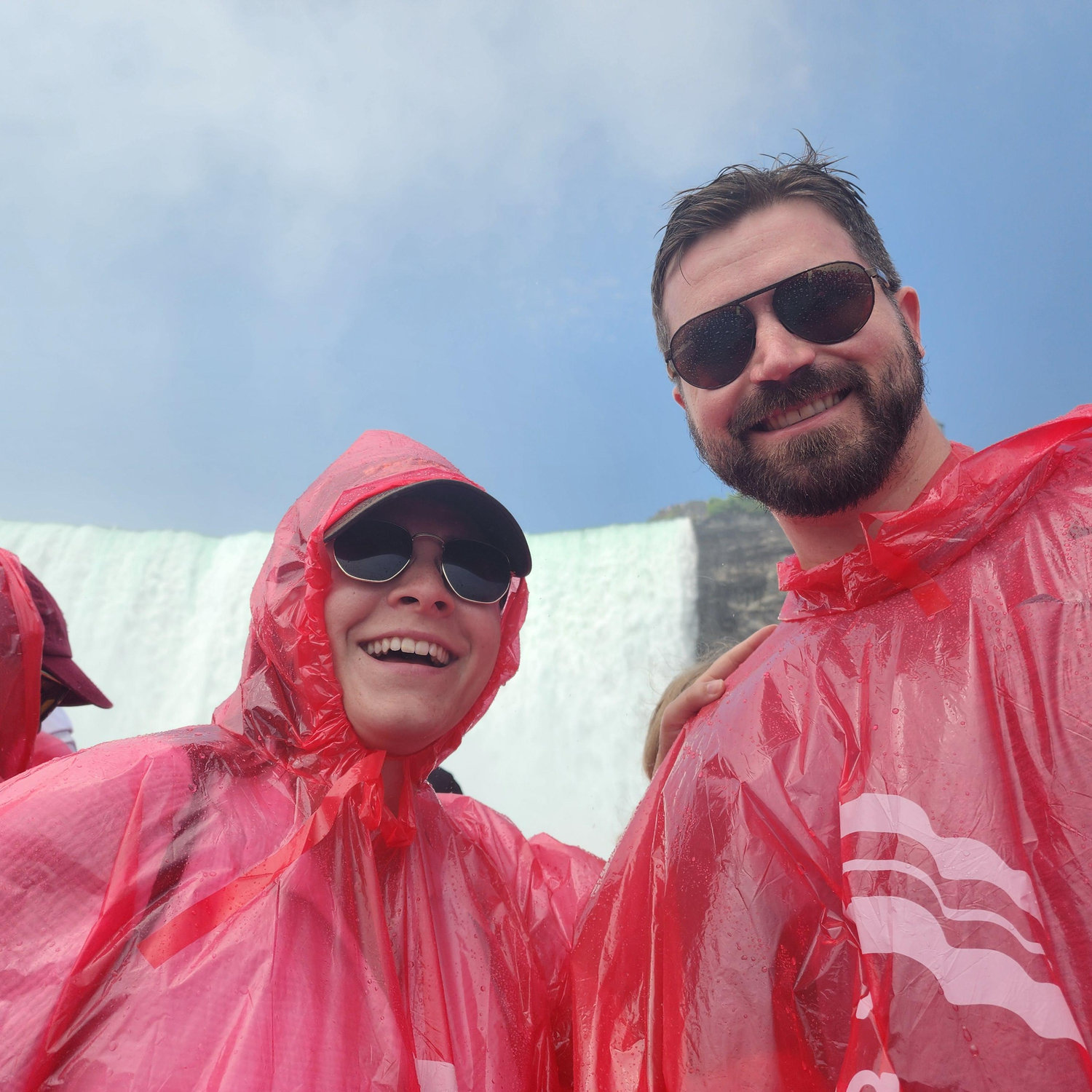 On the Maid of the Mist at Niagra Falls, Canada. Blissfully unaware Pat had a ring in his pocket.