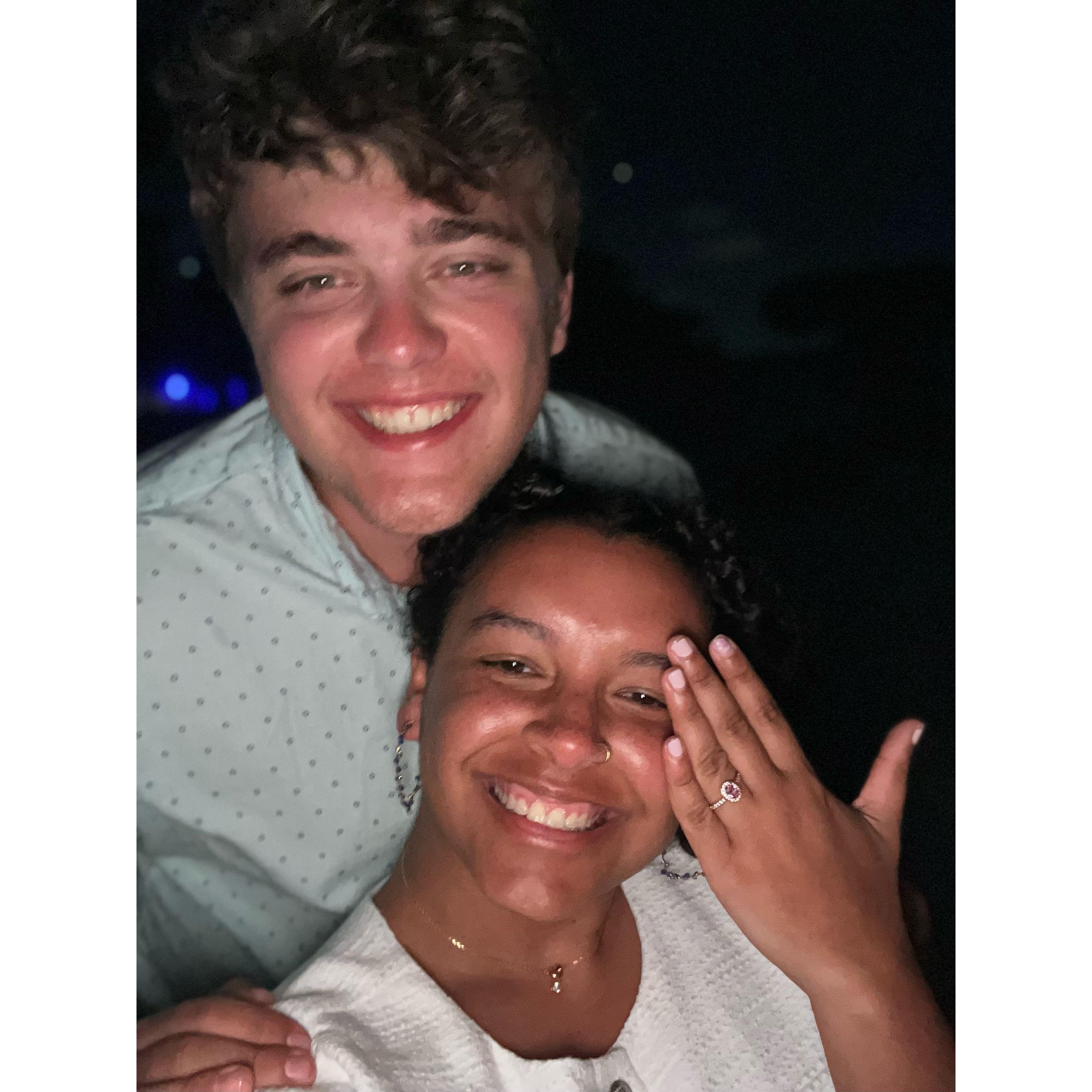 We took this picture after he proposed on a rock in front of the beach with the moonlight reflecting. 3/3