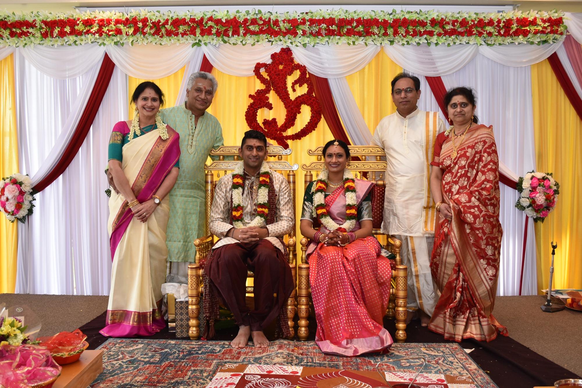 Working on their photo-worthy smiles ahead of the wedding at the Hindu Engagement ceremony