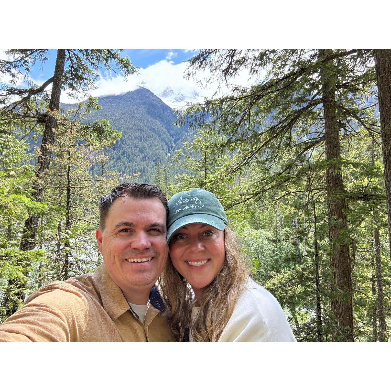 In Whistler on a hike. When we started the hike, it was sleeting, and when we finished, it was sunny and hot. We look like wet dogs!