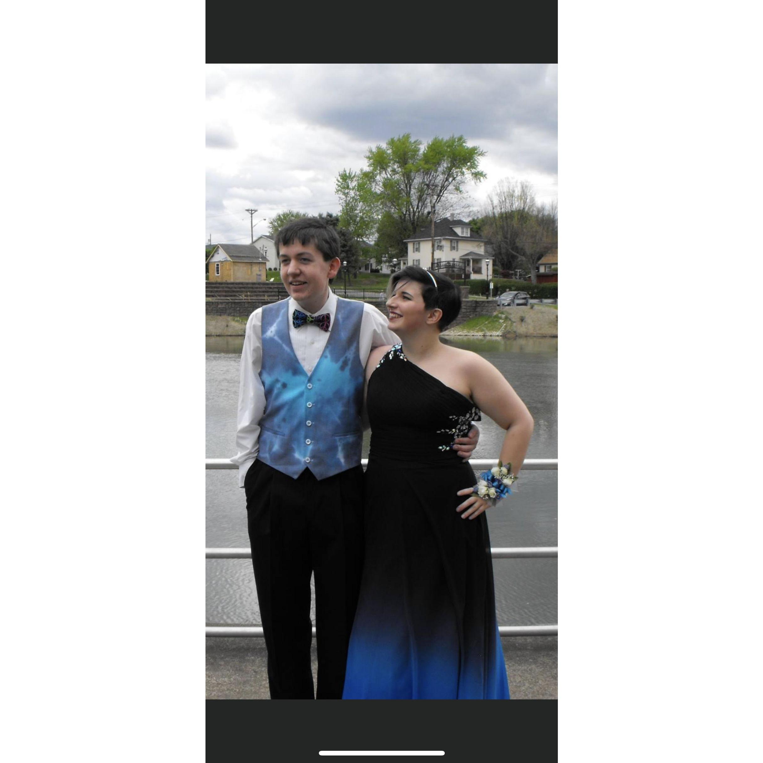 Our first prom together. We had only been together for a couple weeks at this point, neither of us knew that 8 years later I would be looking at him like this at an altar.