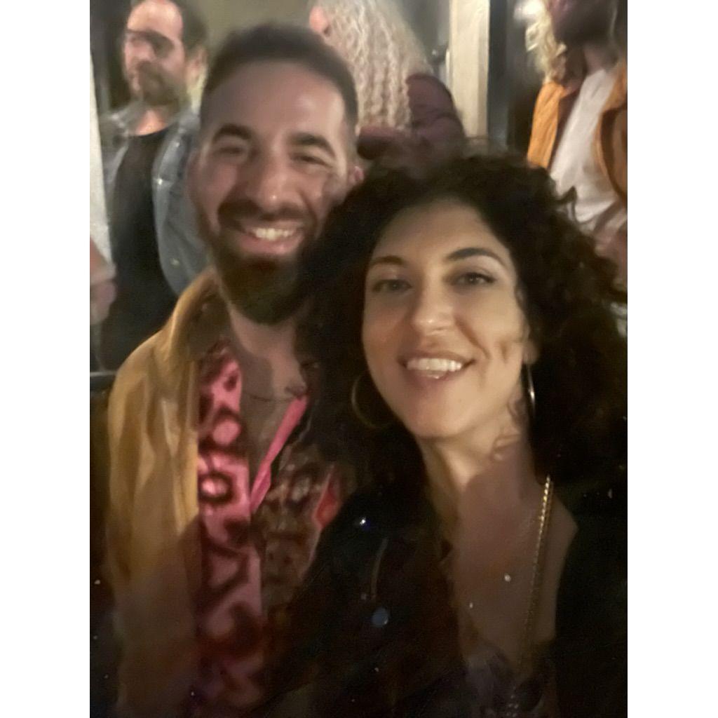 Our first photo ever together! featuring Jon in the background :)