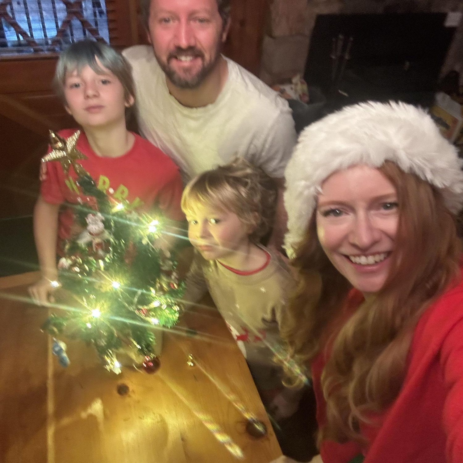 Decorating a mini tree with Arlo and Atlas on Christmas Eve